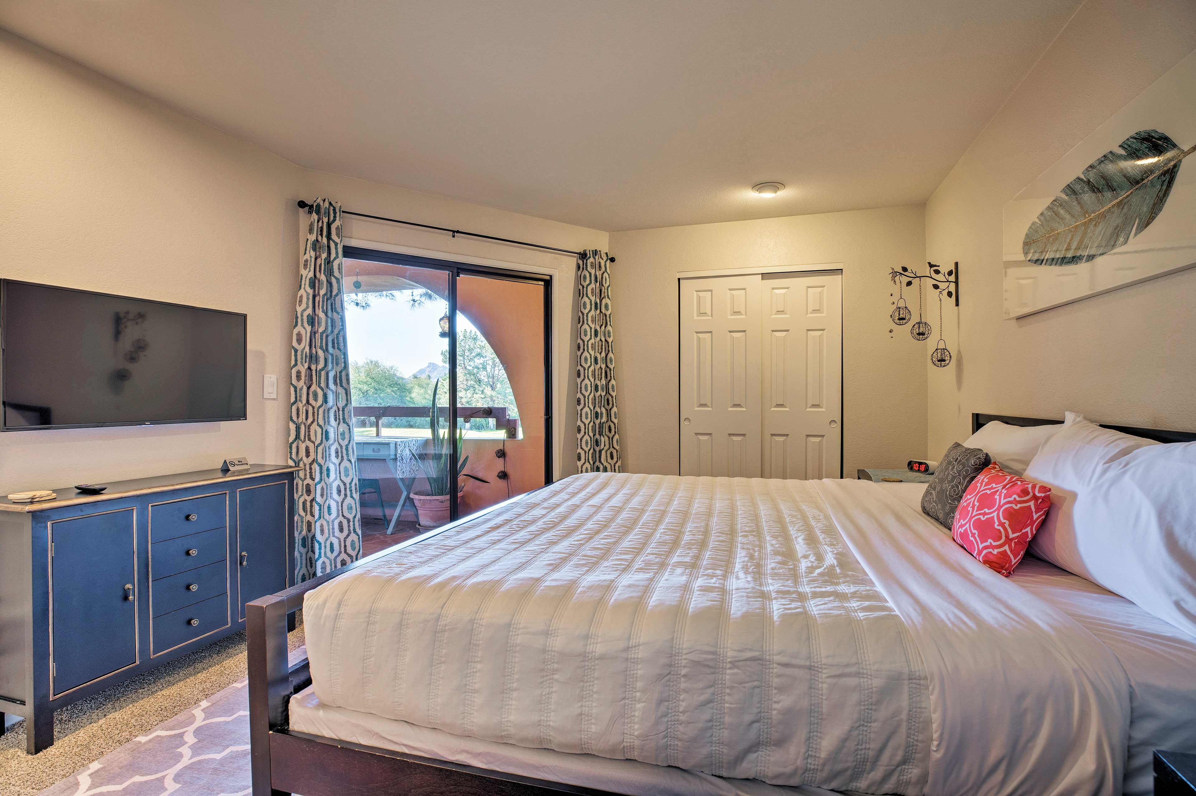 The bedroom has a king-sized bed.
