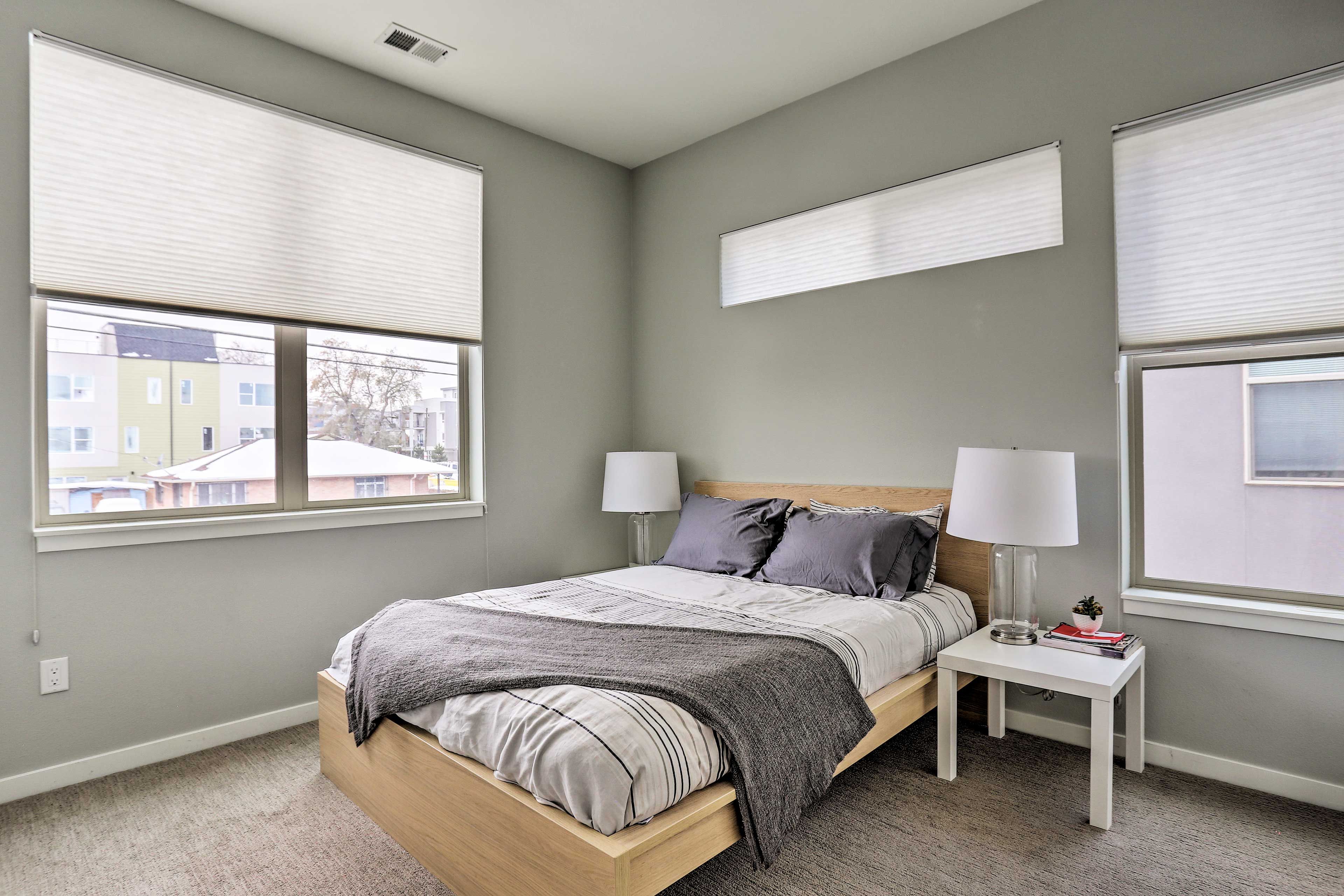 This first bedroom is highlighted by Scandinavian-style furnishings.
