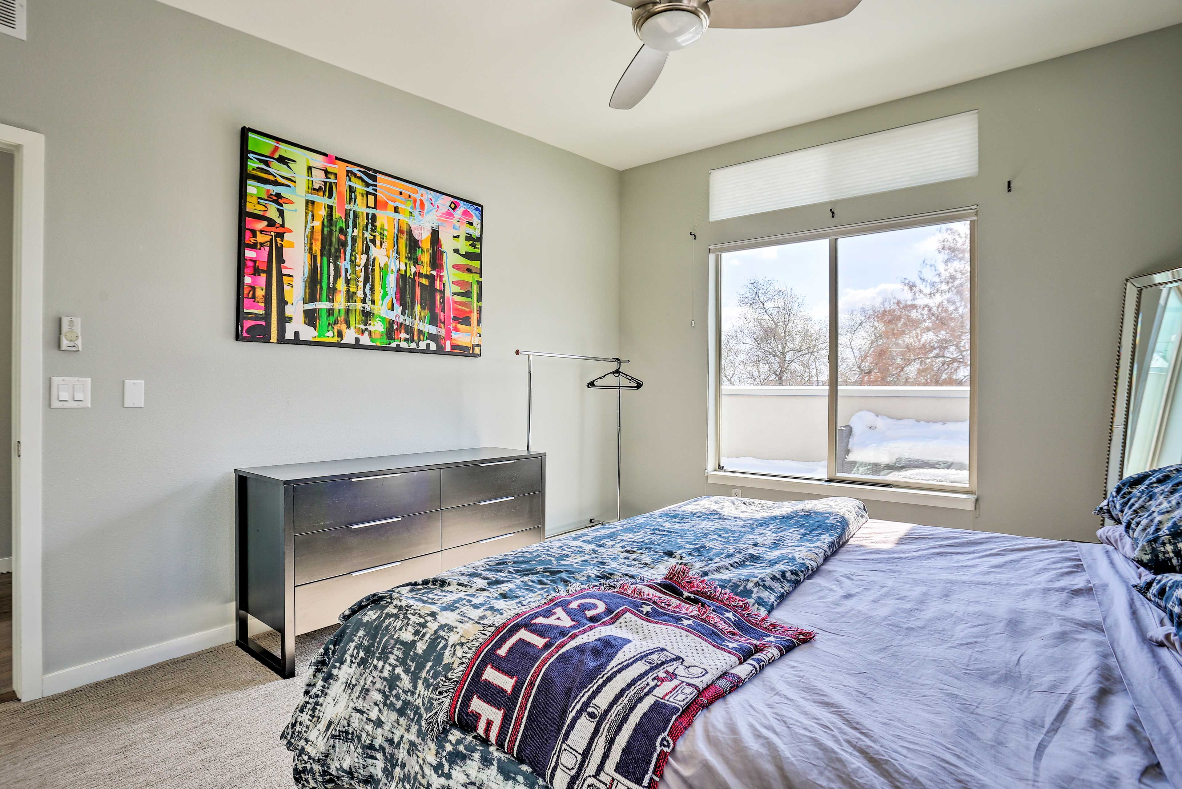 The bedroom suite stands apart with a king-sized bed.
