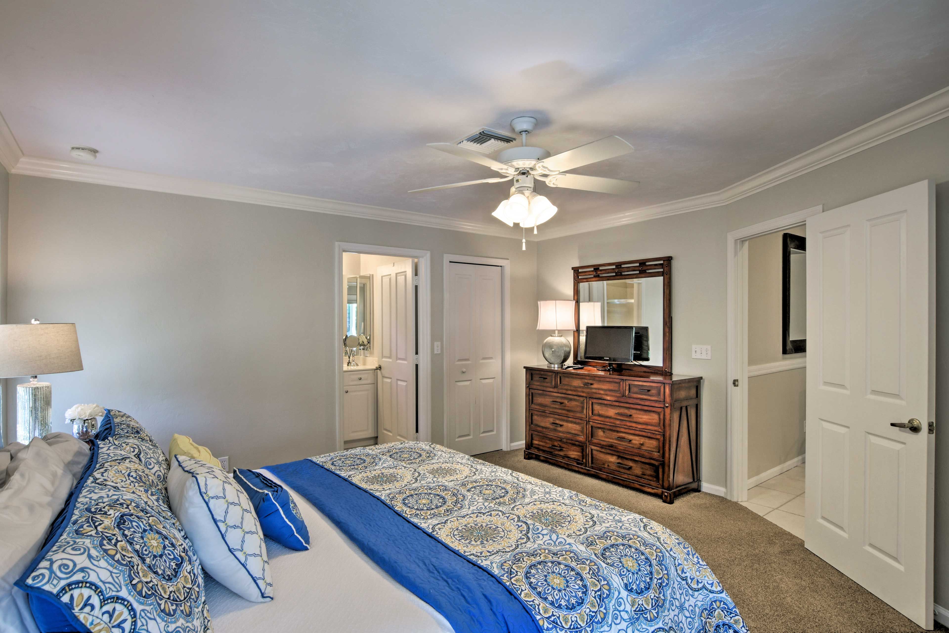 Cozy up under the covers and watch a show on the flat-screen TV.