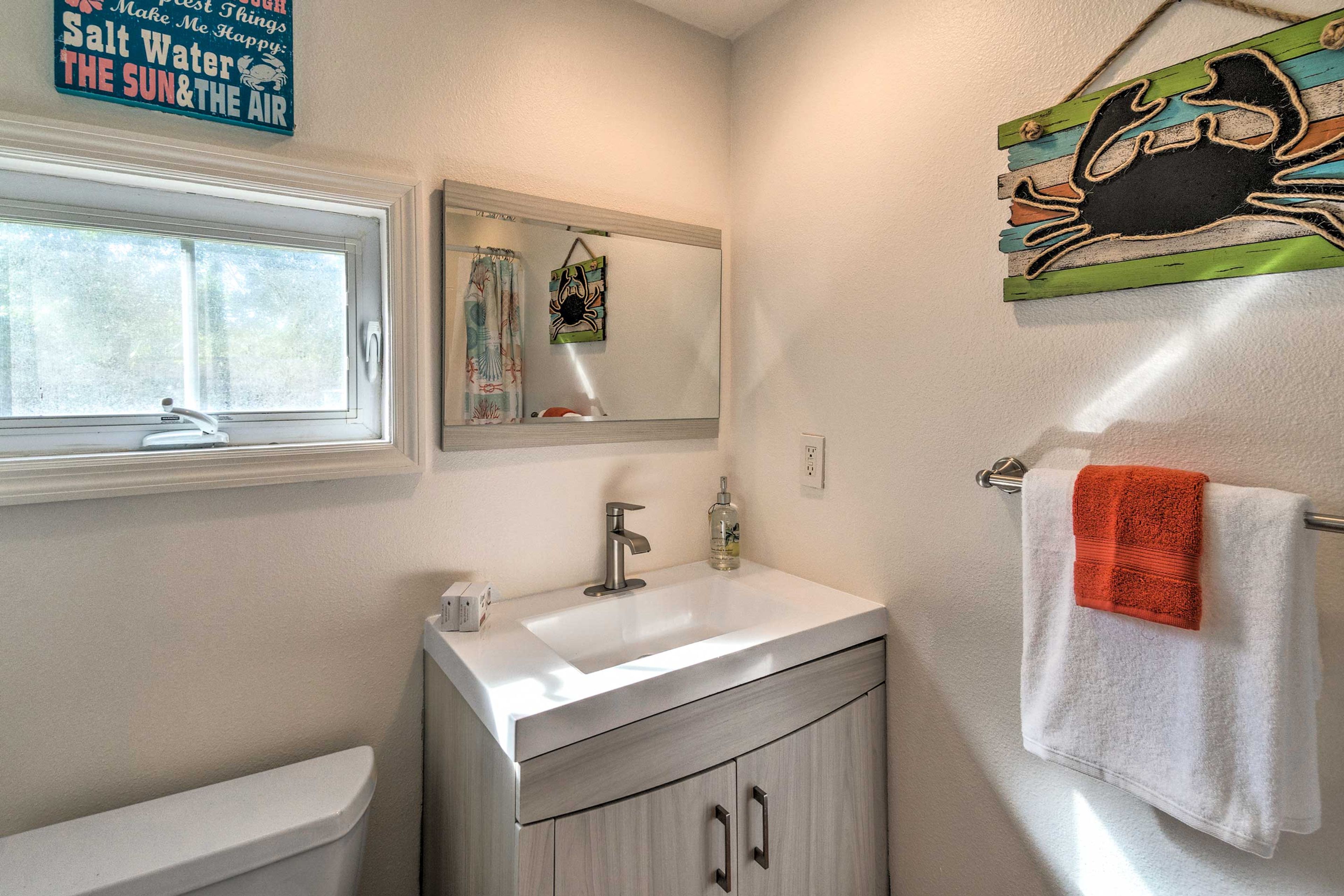 Towels are provided in the bathroom.