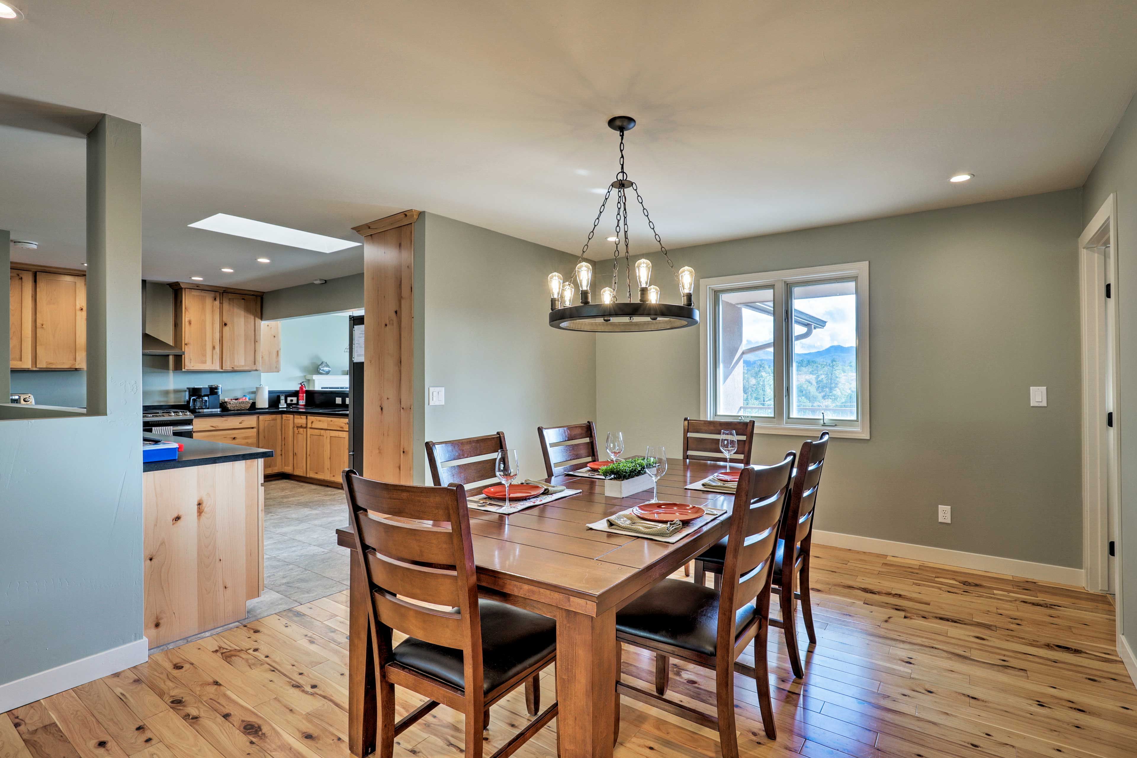 Share a home-cooked family meal around the dining table set for 6.