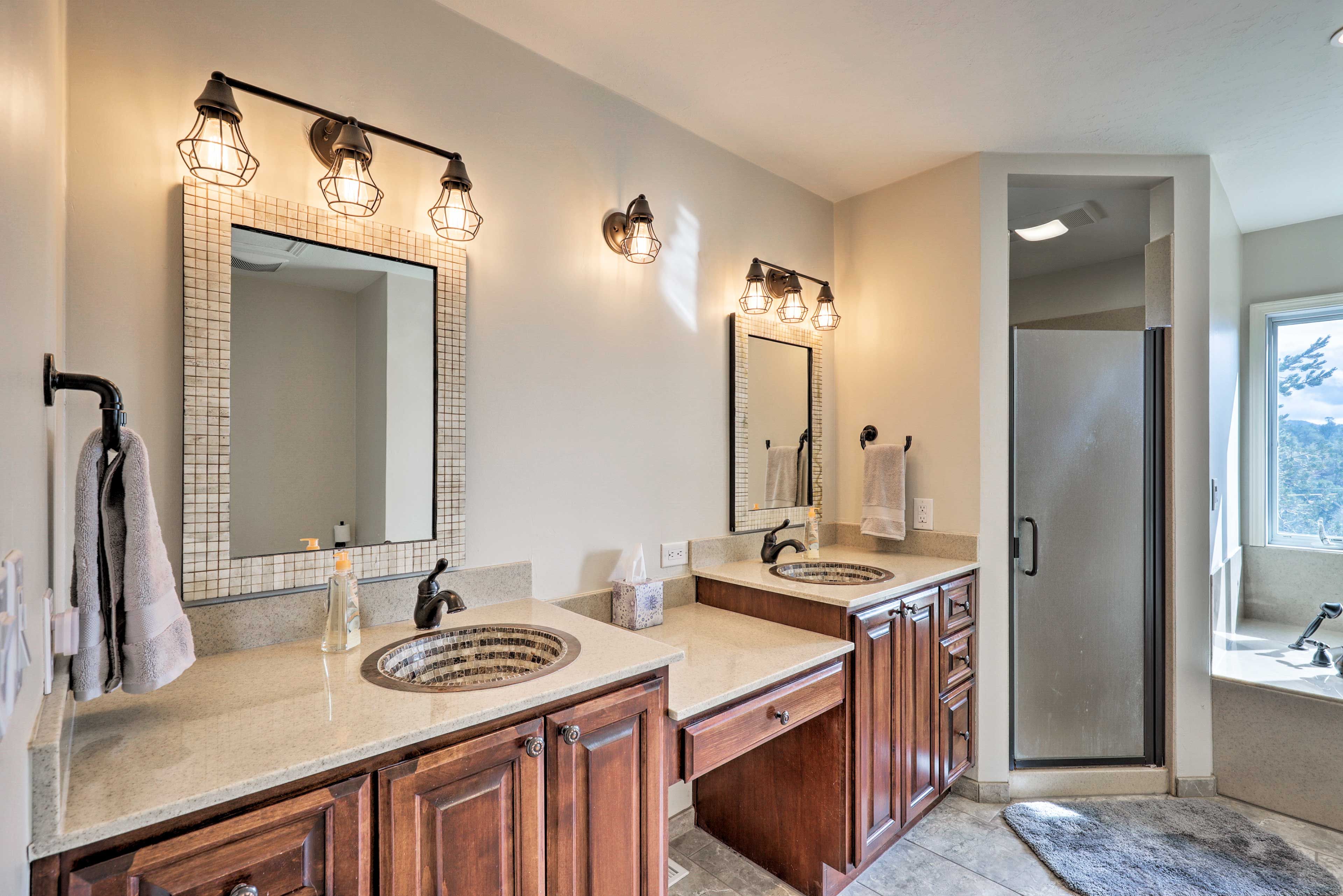 The updated en-suite is complete with double sinks, walk-in shower & tub.