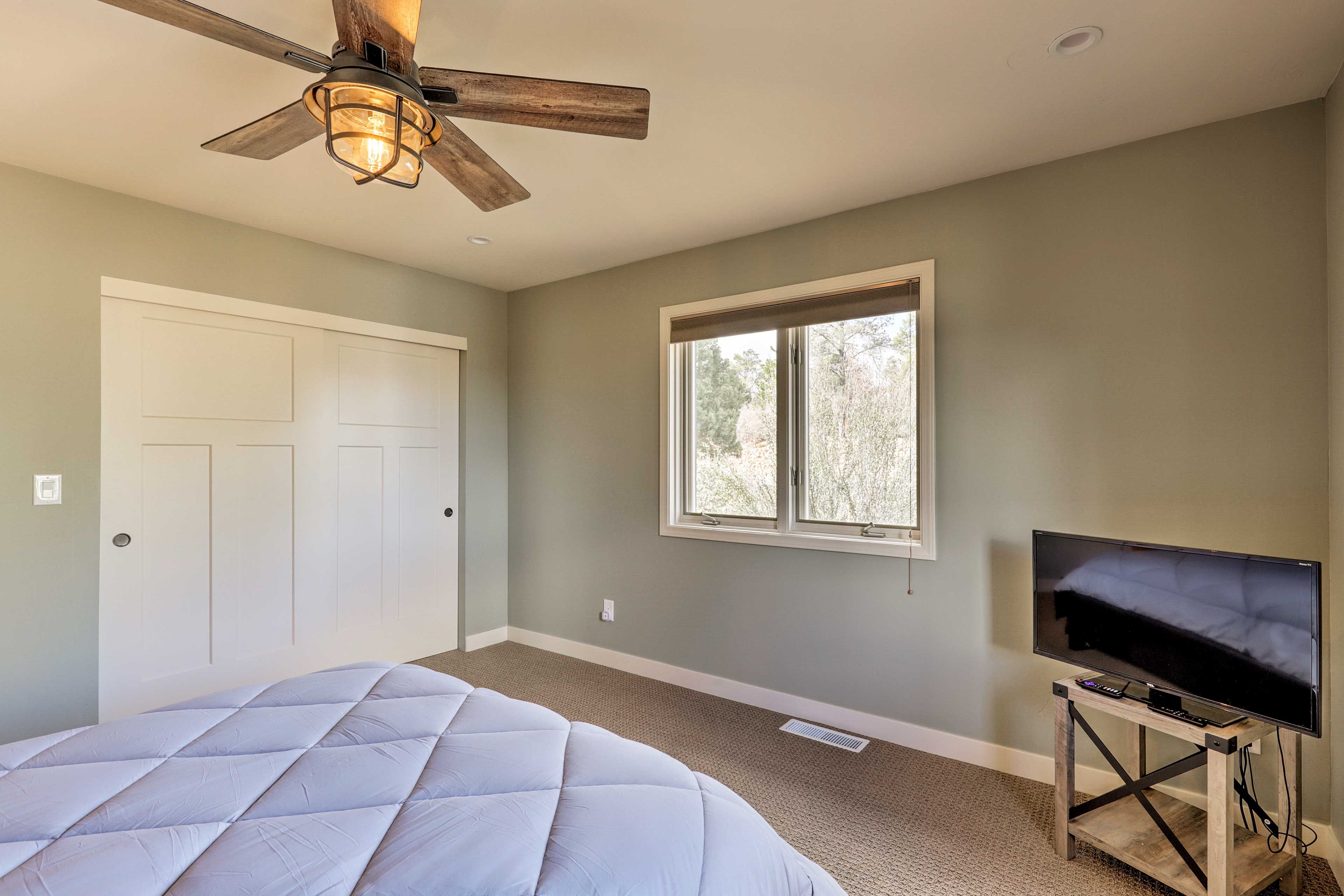 Two travelers will sleep comfortably in this room.