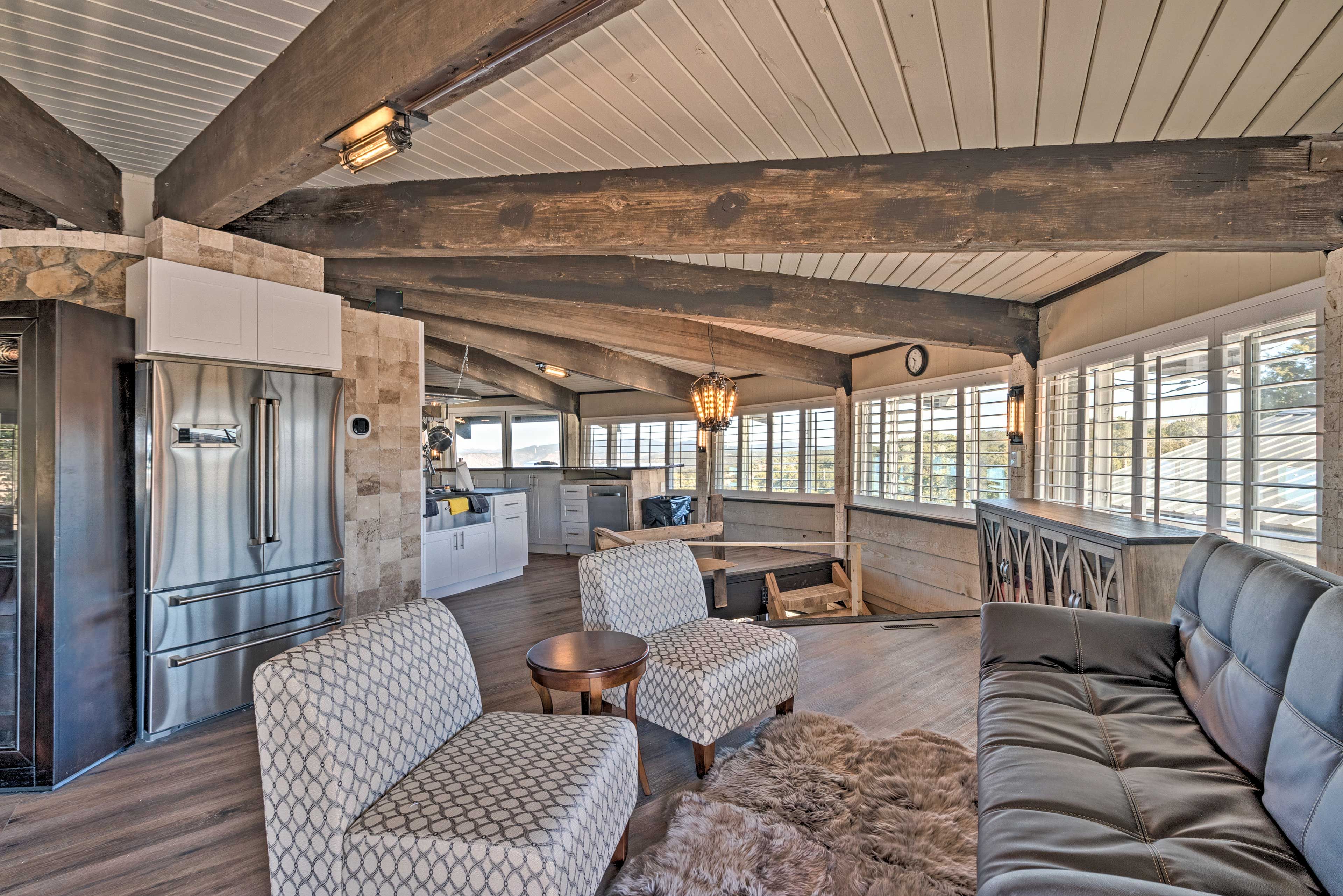 The exposed beam ceiling adds more character to the room.