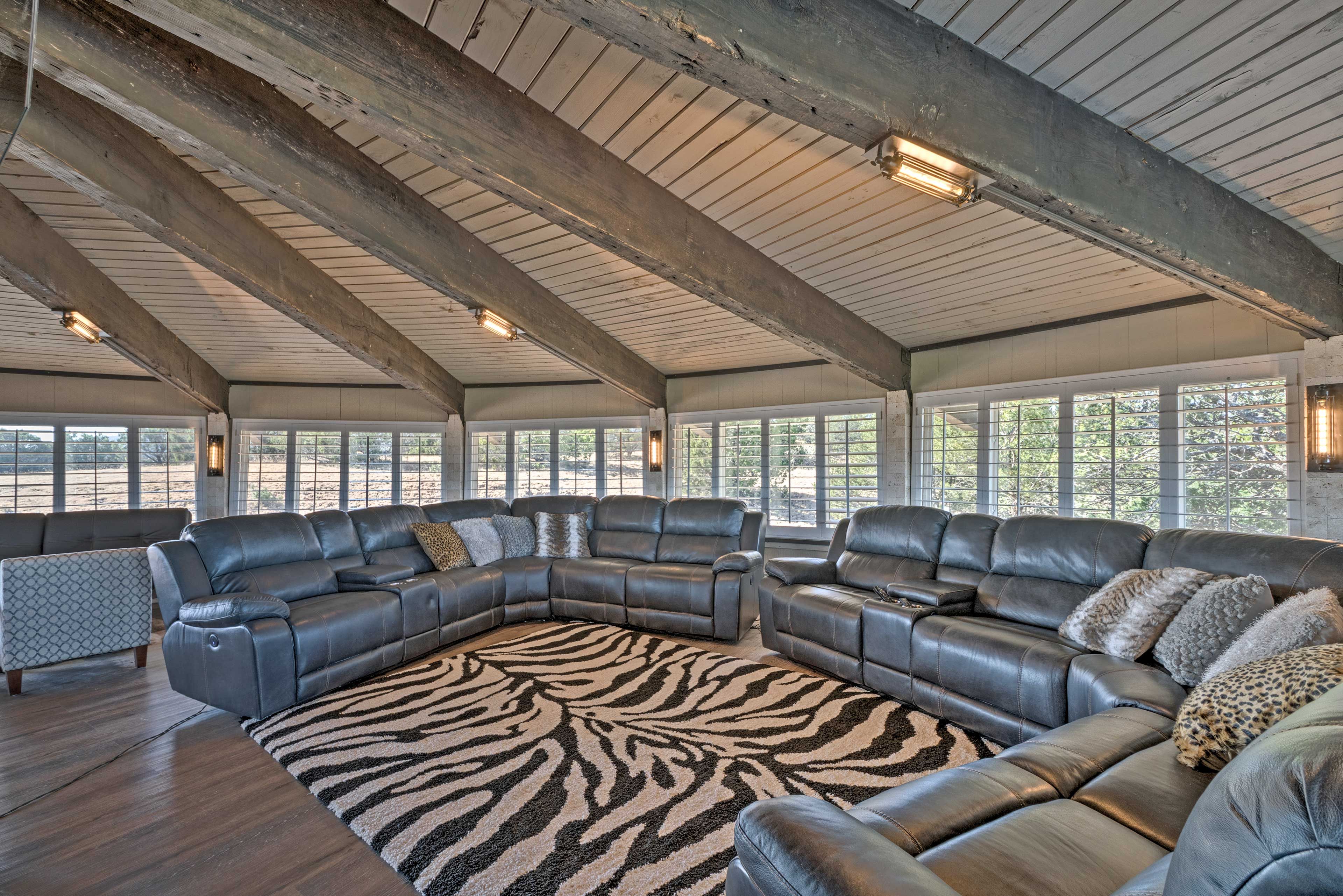 Your crew will find plenty of seating on the 2 leather L-shaped sofas.