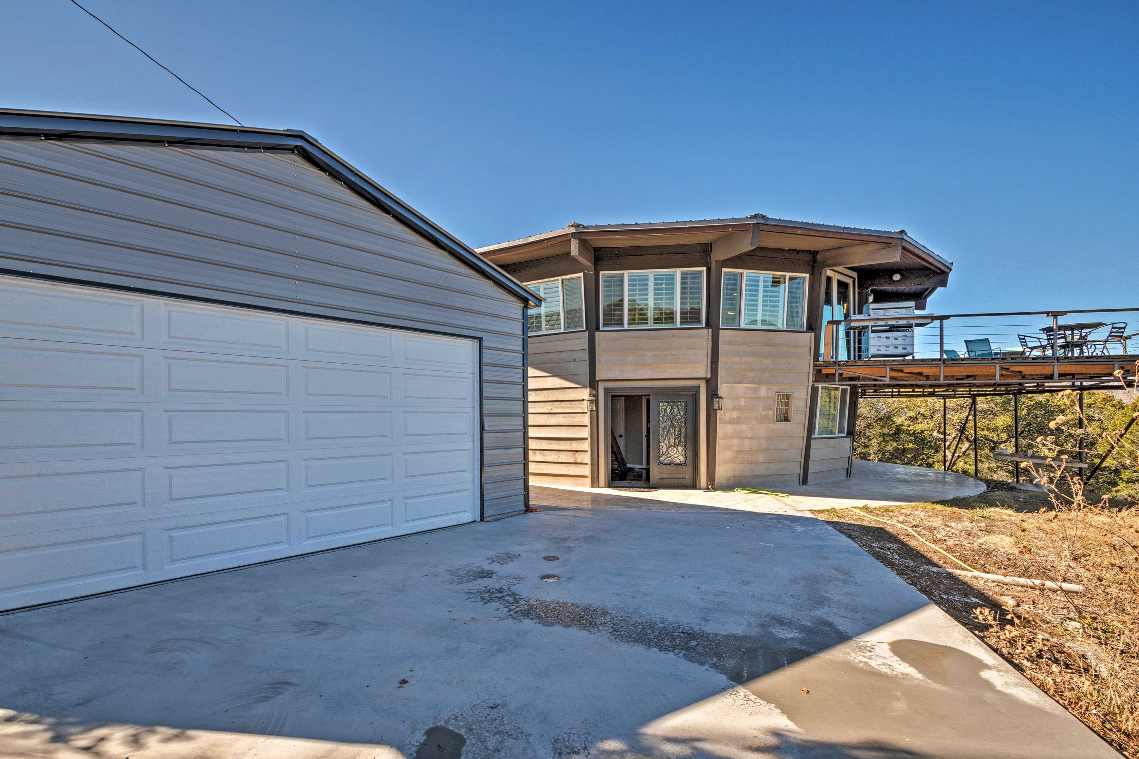 The property offers covered parking for 2 vehicles, plus driveway parking for 4.