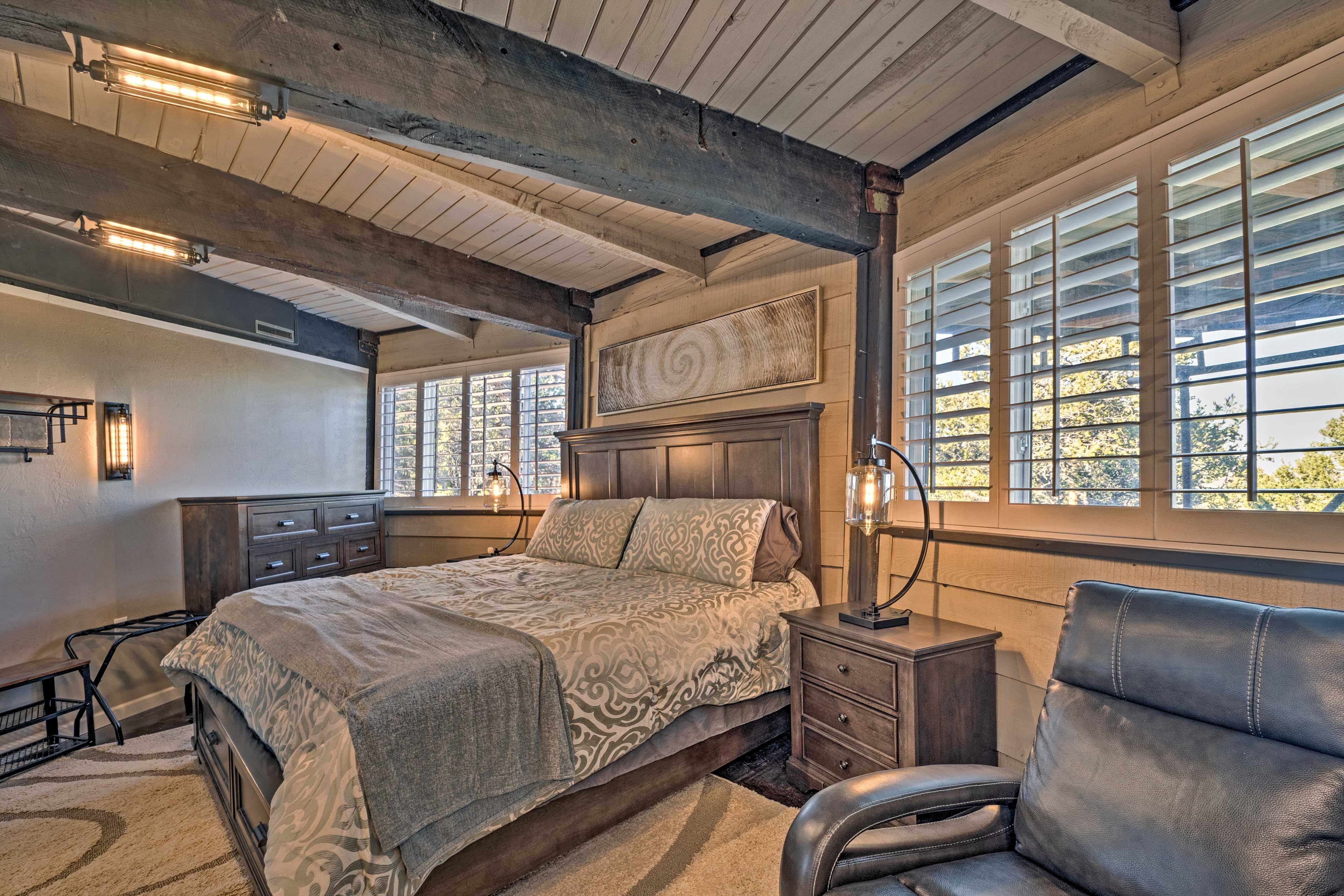 This well-lit space features a king-sized bed.