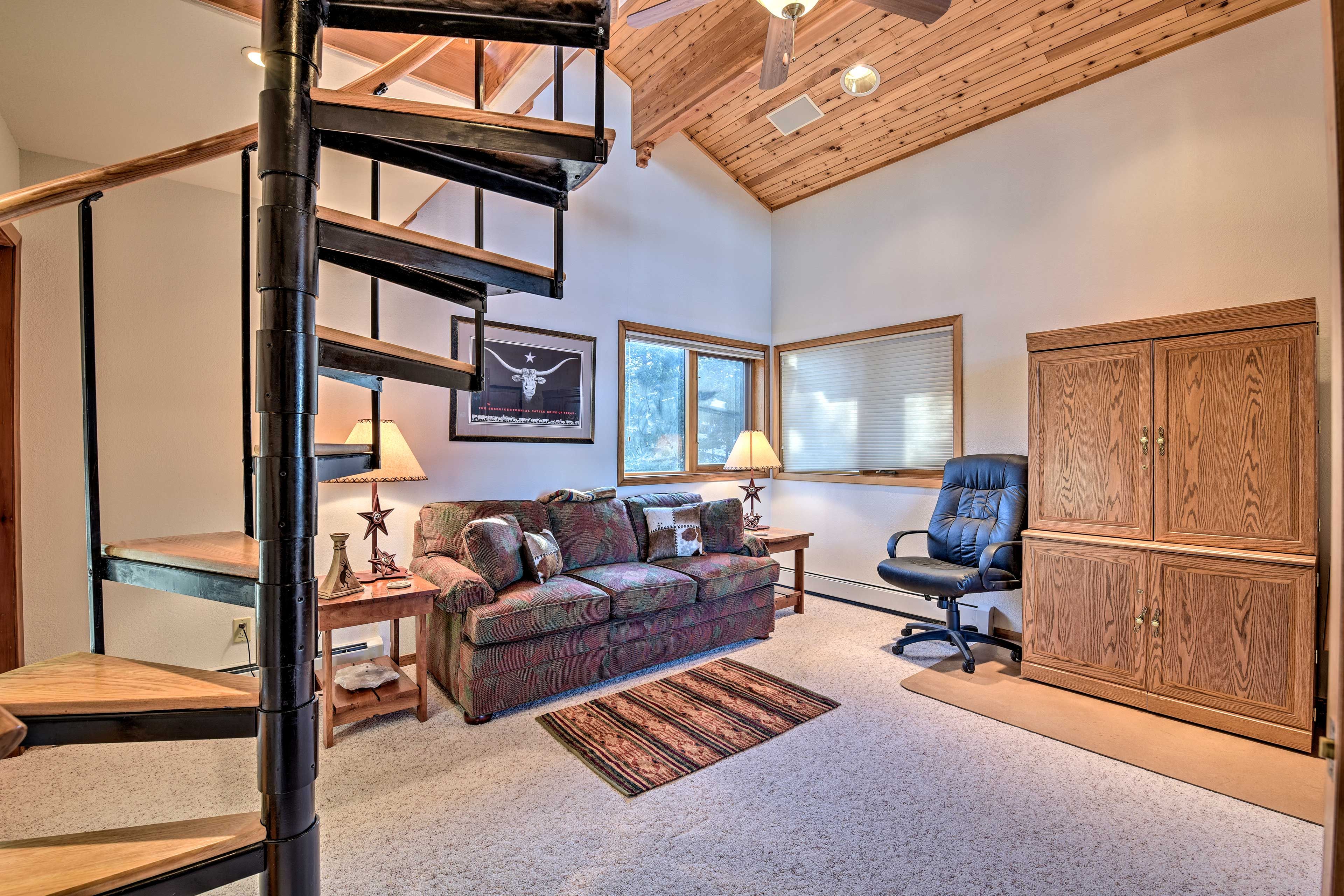 Take the spiral staircase to the loft.