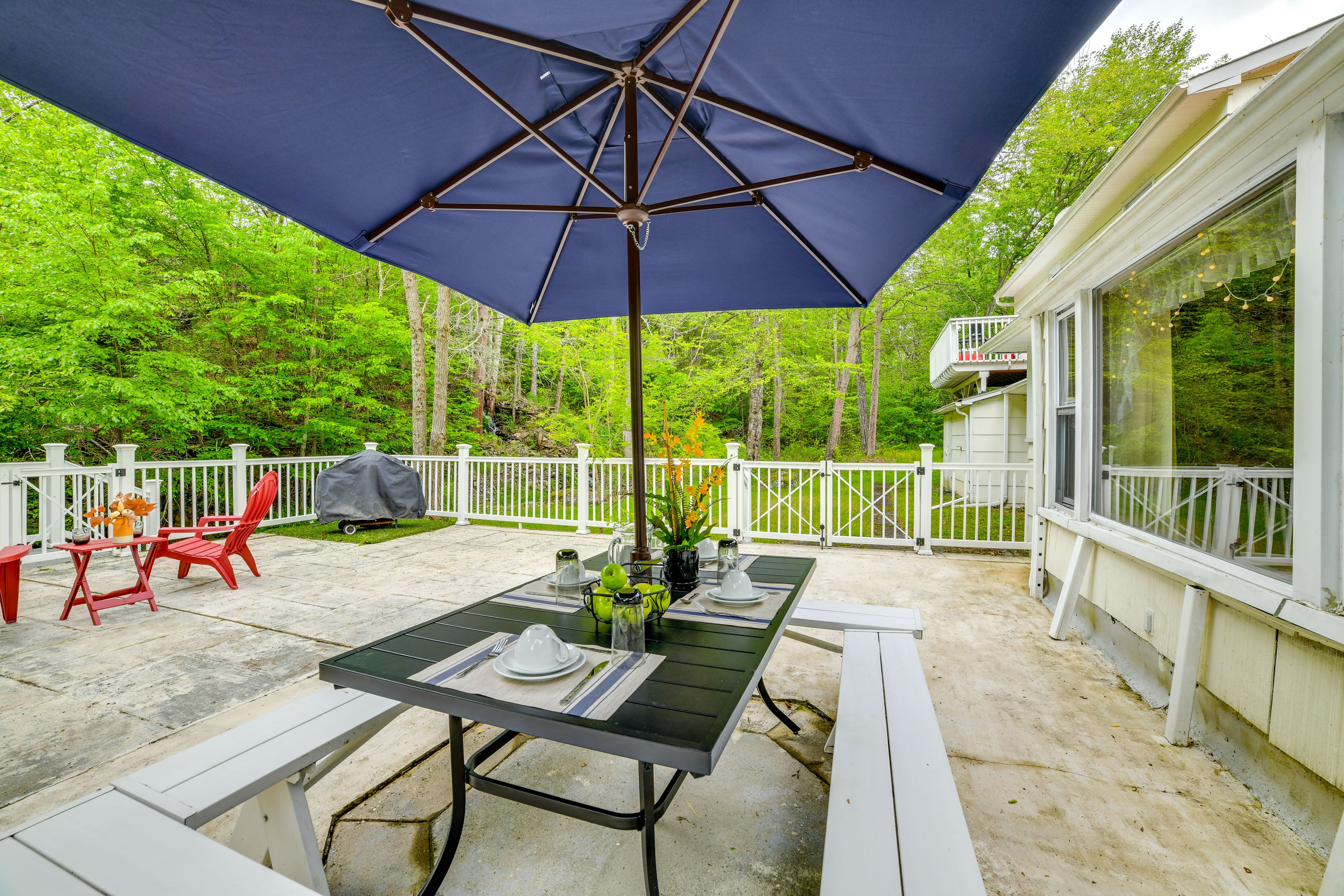 Fenced-In Patio | Dining Area | Charcoal Grill