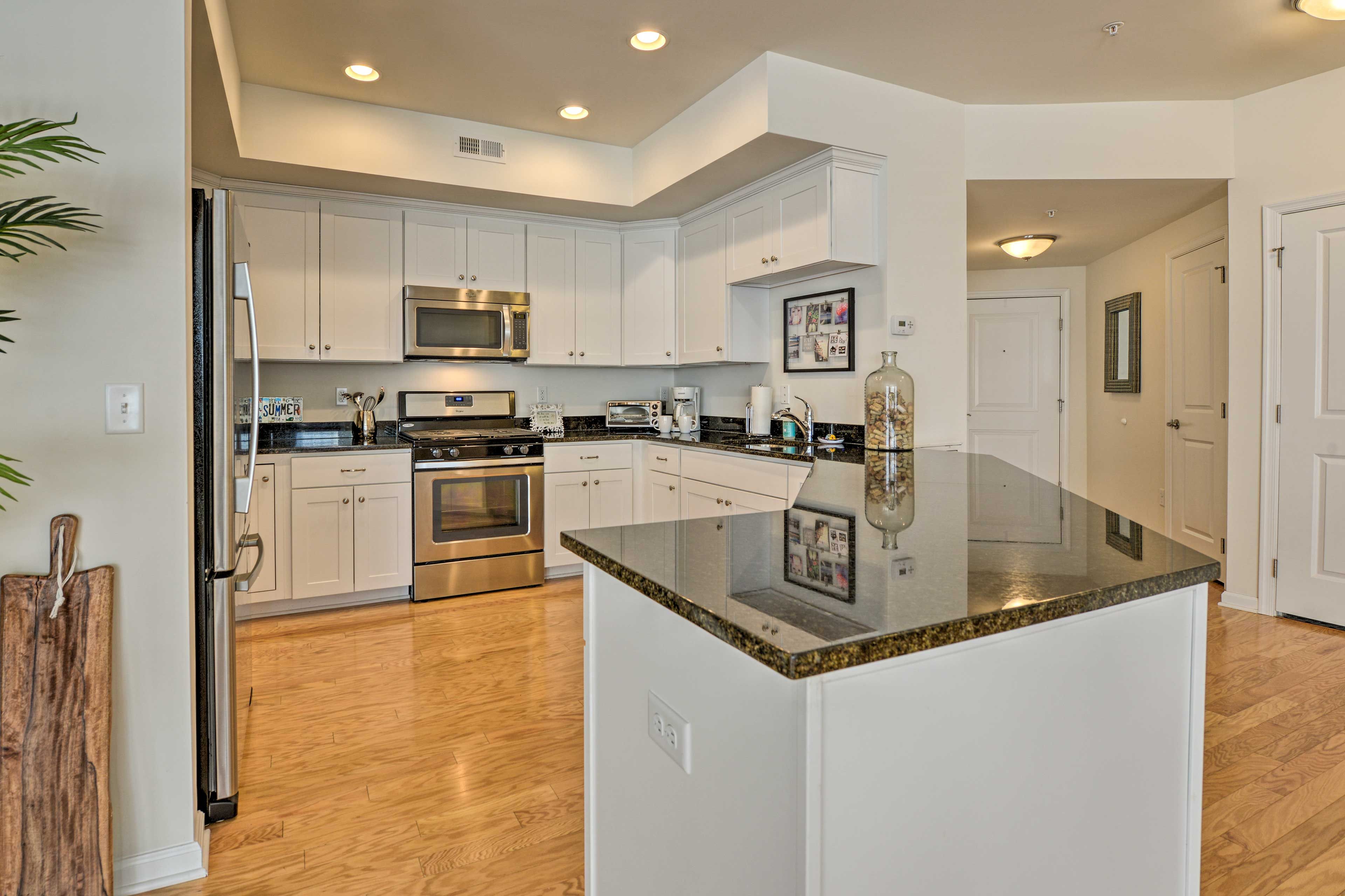 The condo features an open-concept floor plan that flows easily to the kitchen.