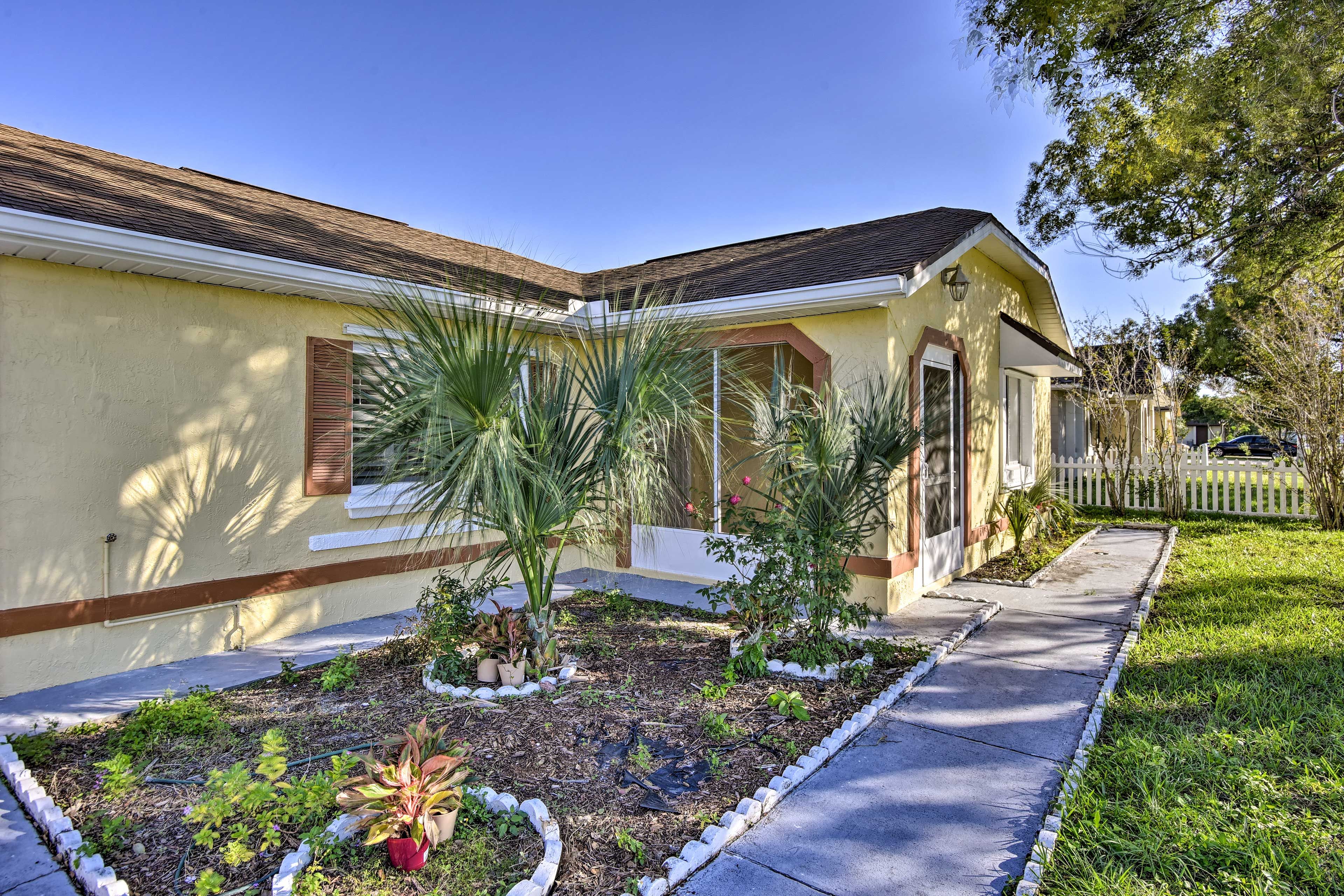 Tropical landscaping completes the yard.