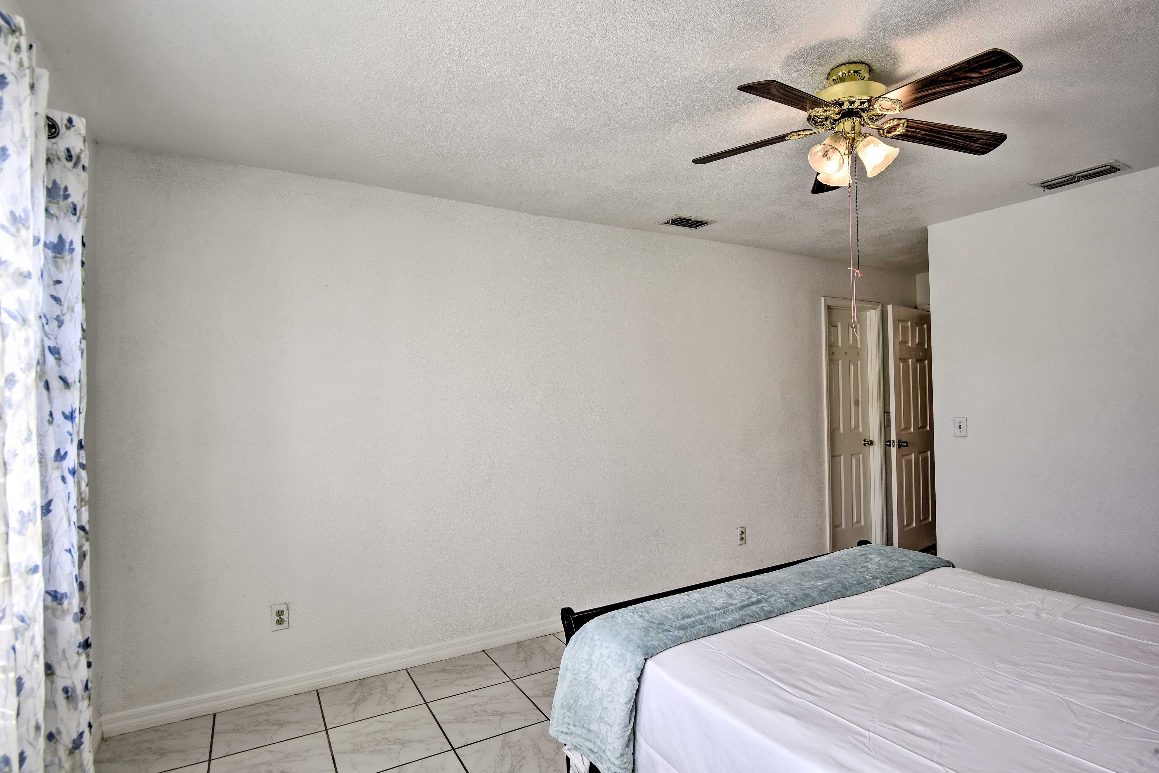 Two guests will rest easy on the queen bed.