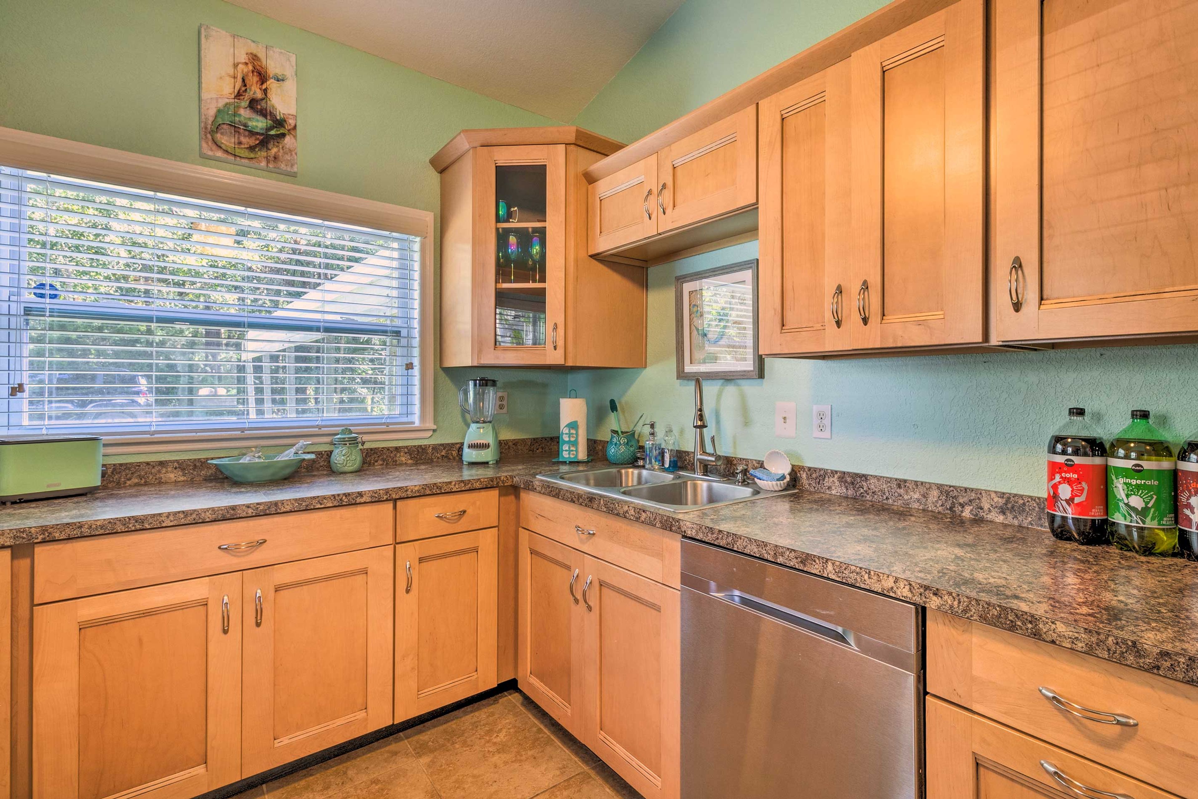 The fully equipped kitchen features a blender, coffee maker, and much more.