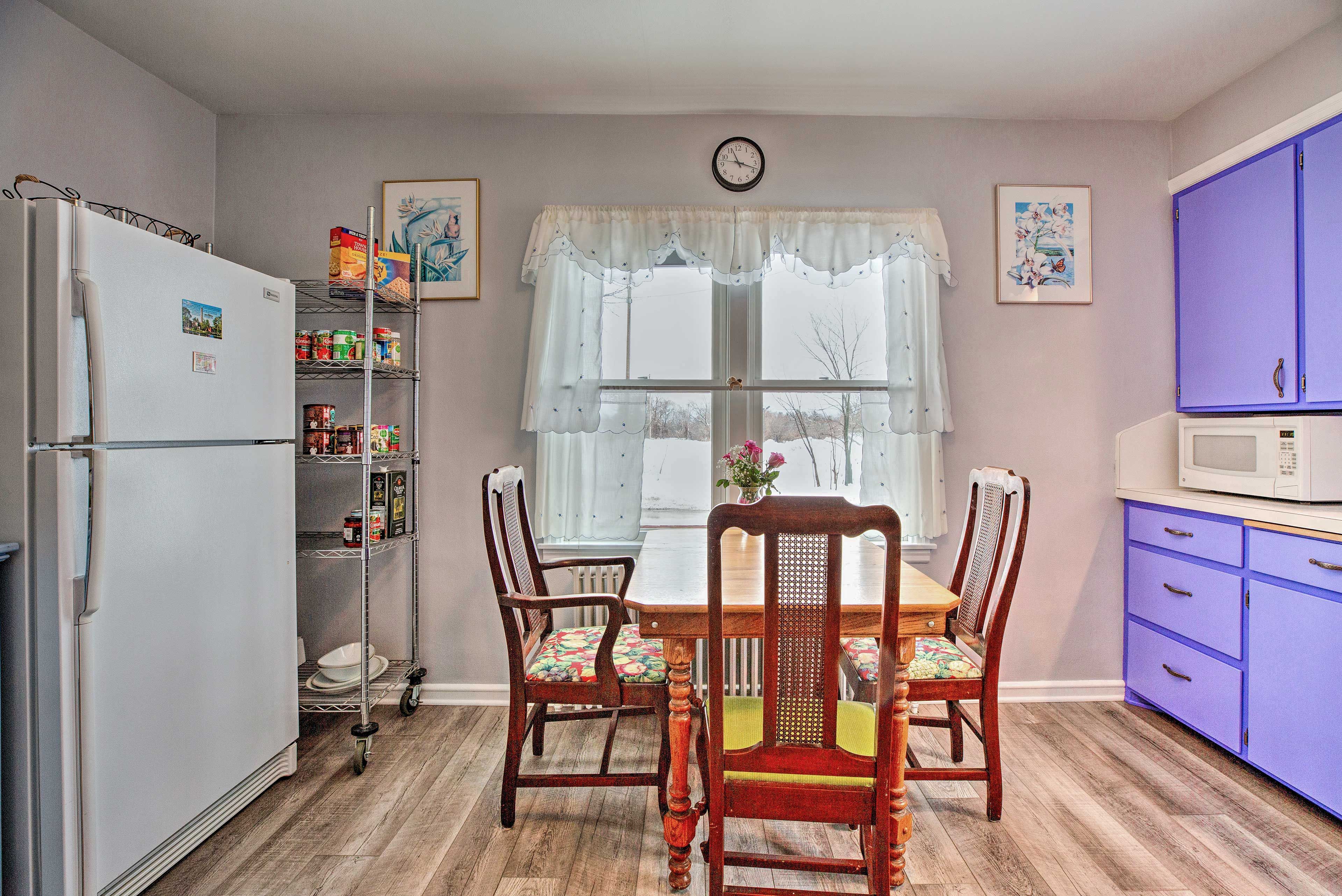 The dining table has seating for 3 guests.