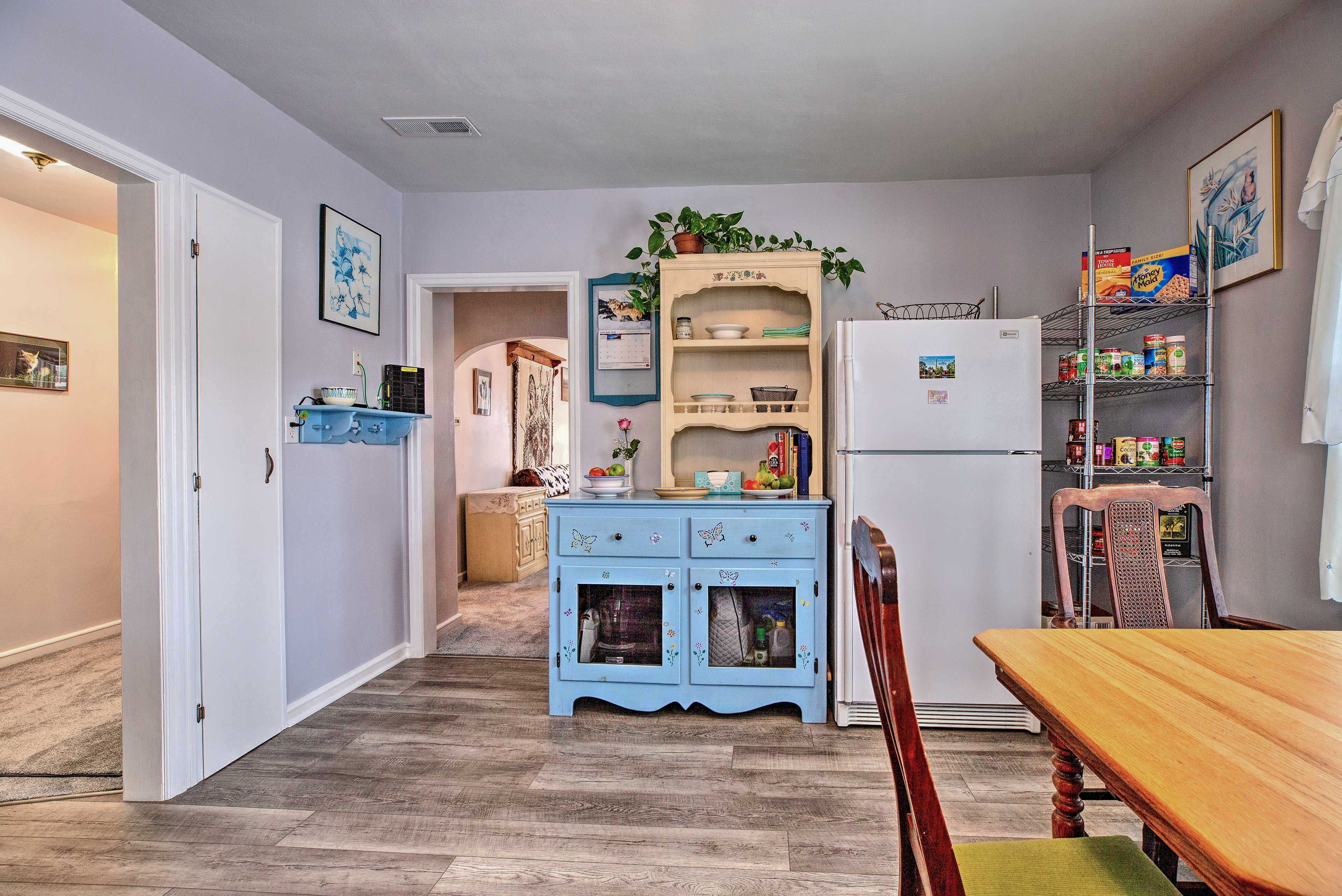 A blender and Crock-Pot come stocked in the kitchen area.