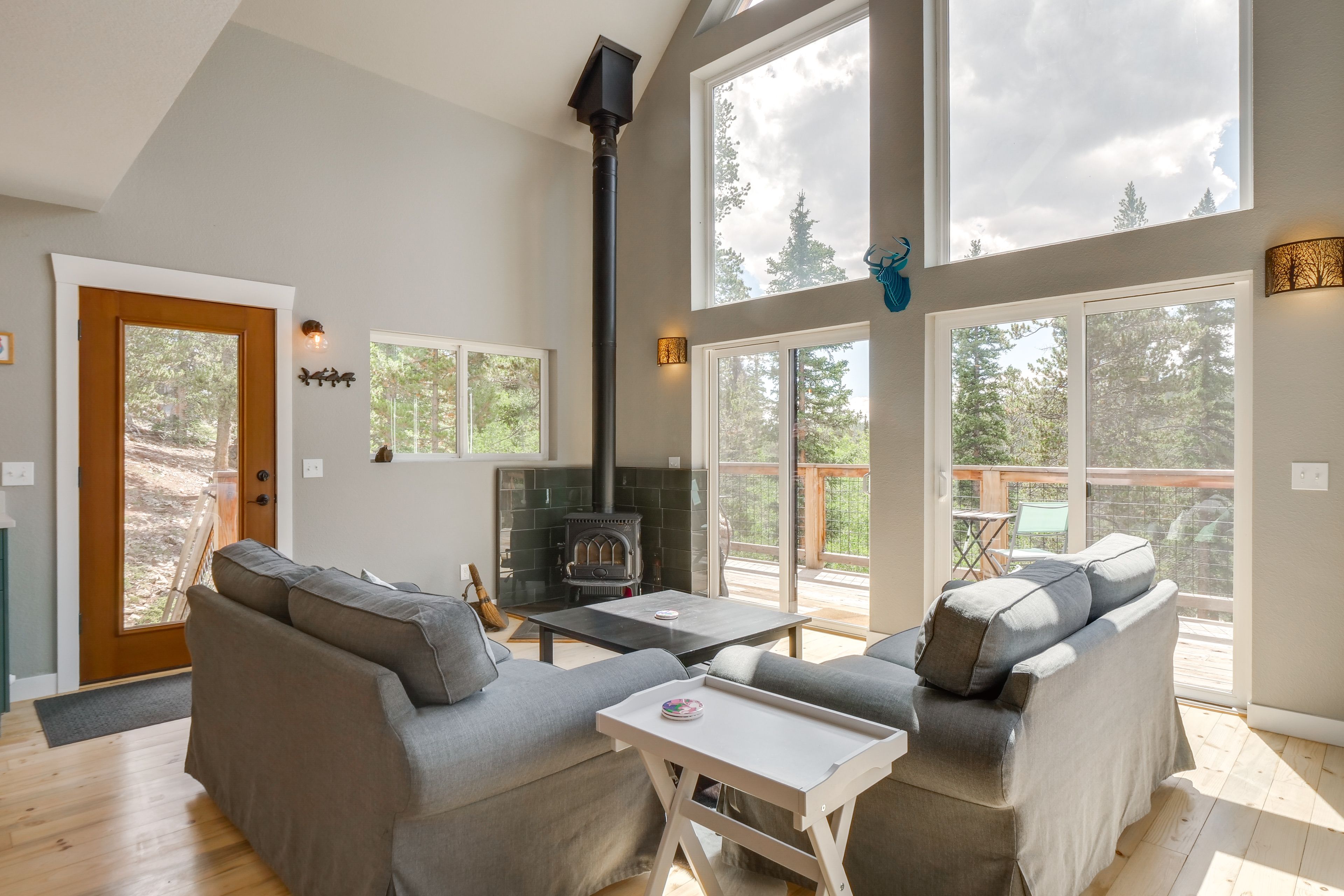 Living Room | Fold-Out Twin Ottoman | Wood-Burning Stove | Board Games
