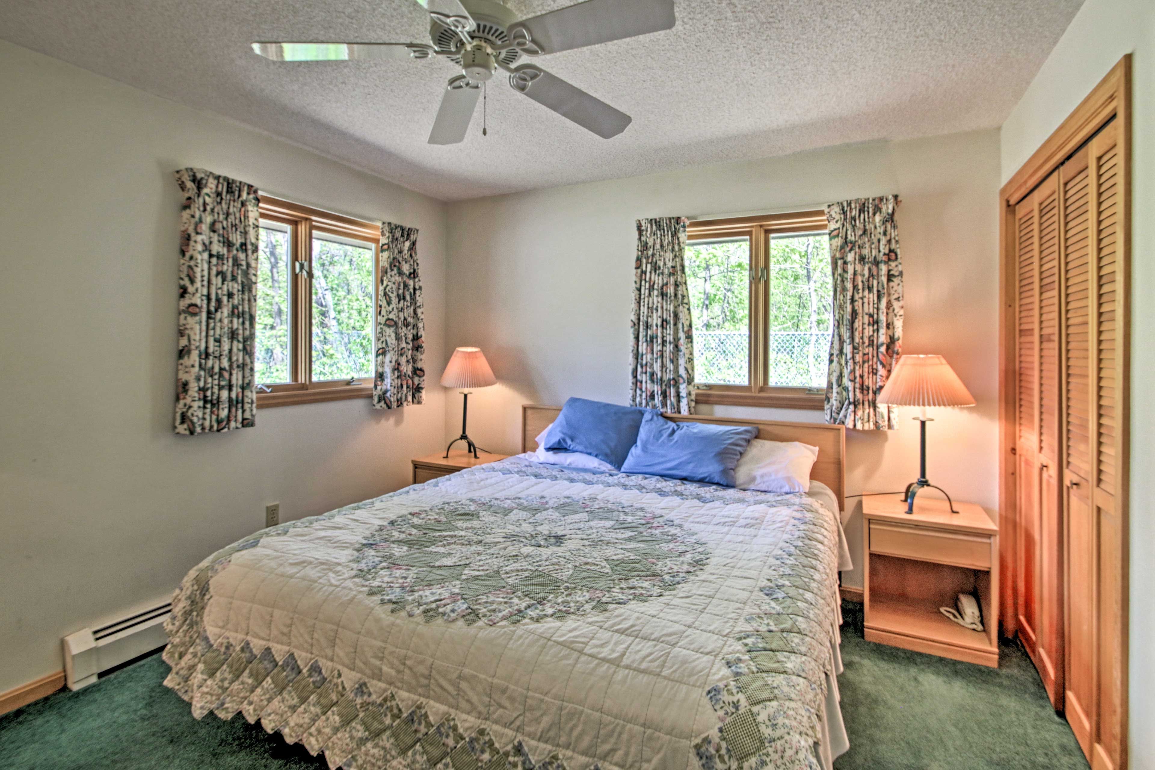 Bedroom 1 features a California king-sized bed.