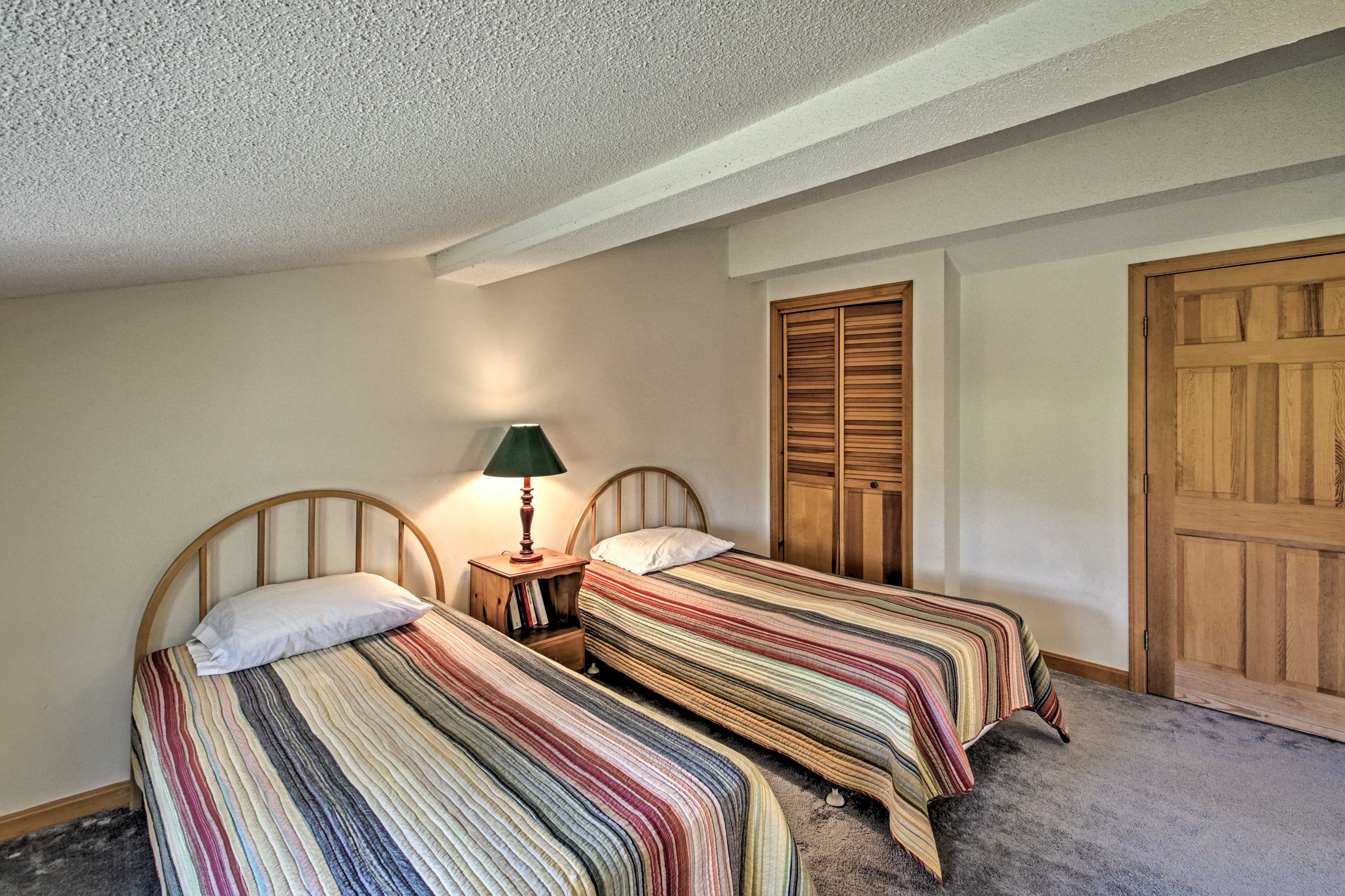 The second bedroom has 2 twin beds.