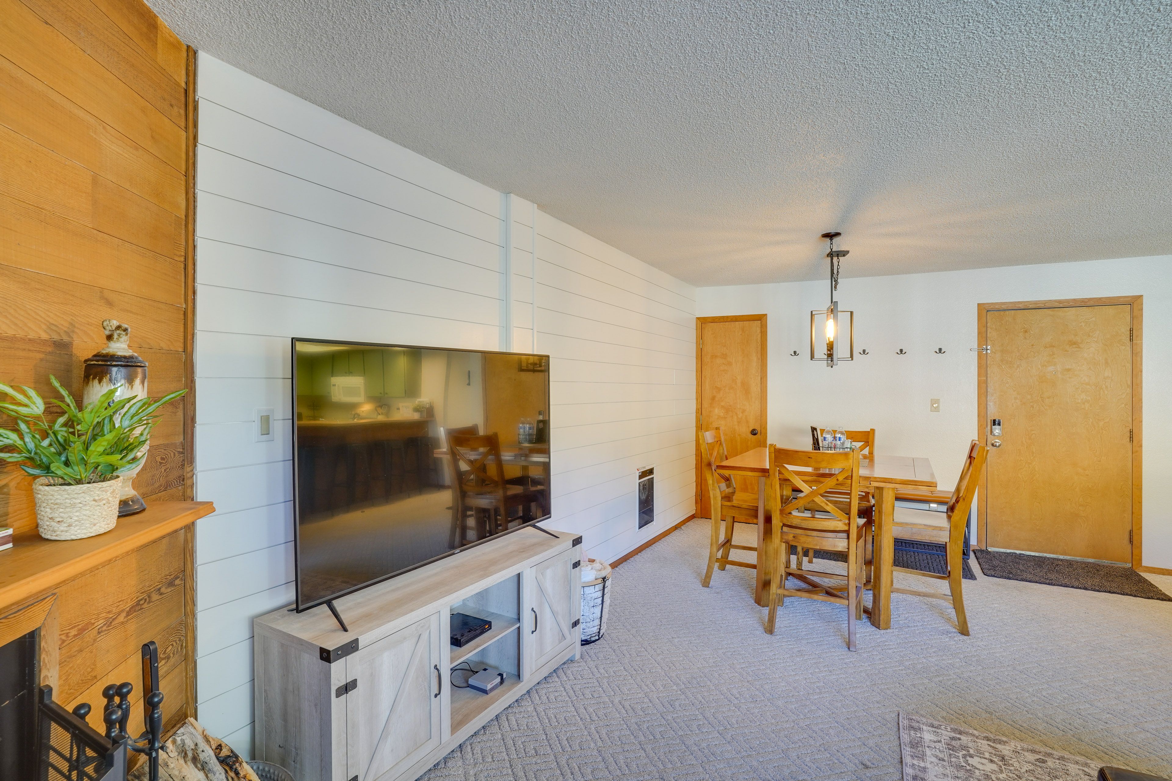 Living Room & Dining Area | Wood-Burning Fireplace | Natural Sunlight