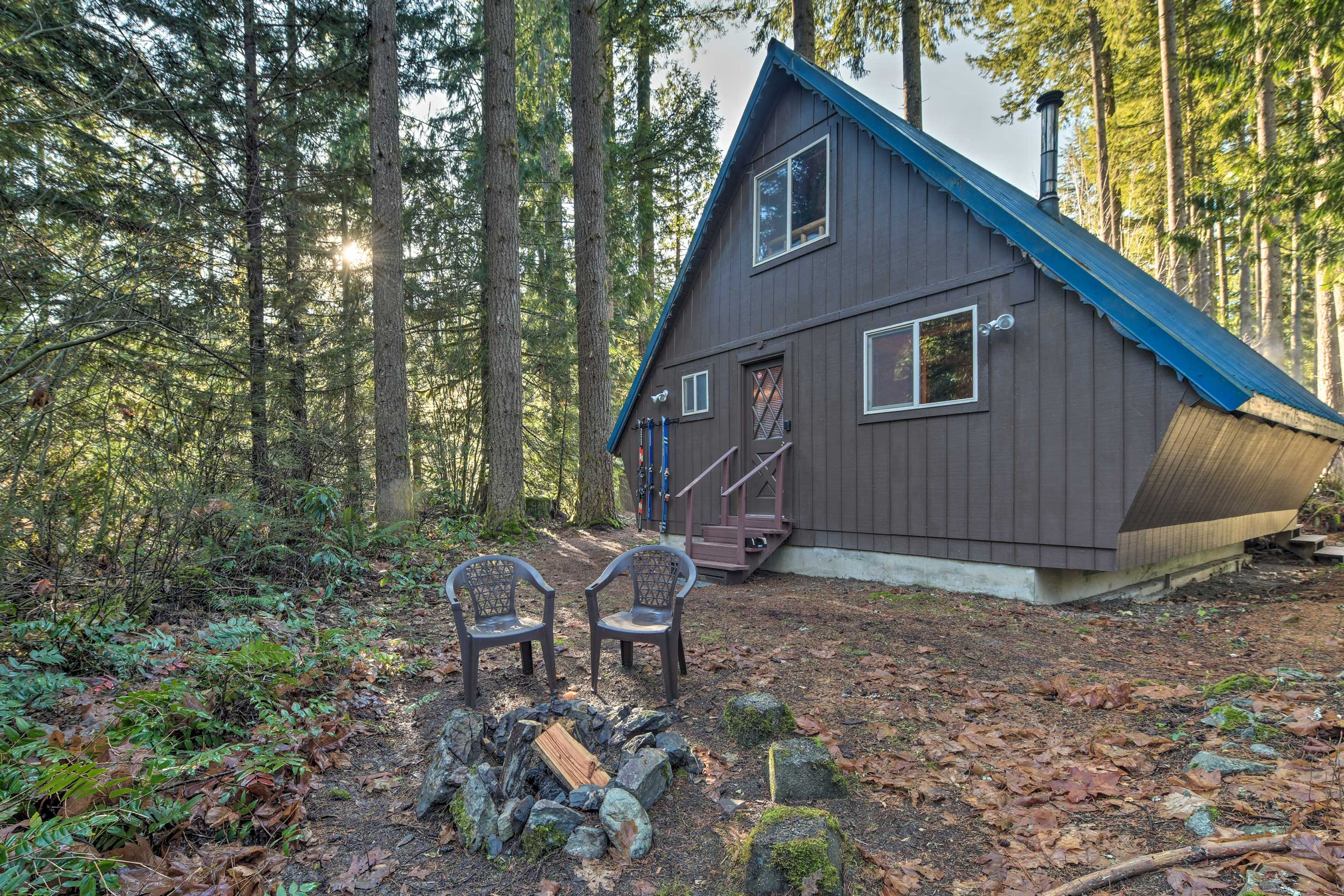 Sit by the fire as you wait for the grill to heat up.