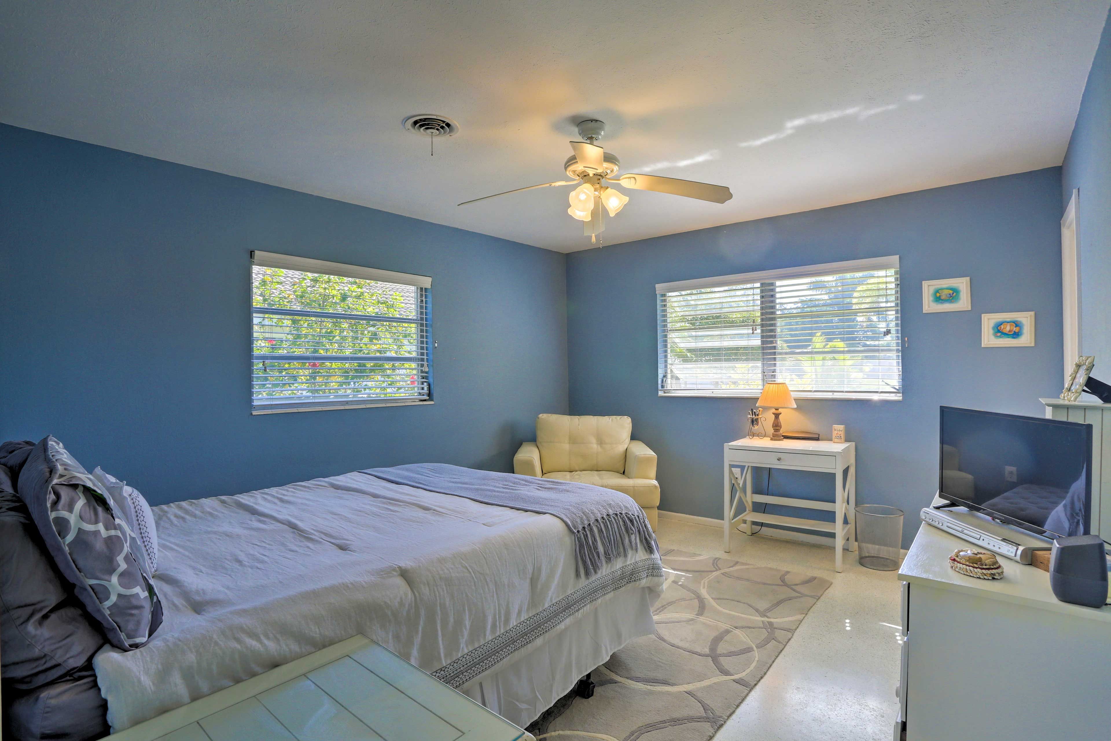Retire to the calming bedroom.