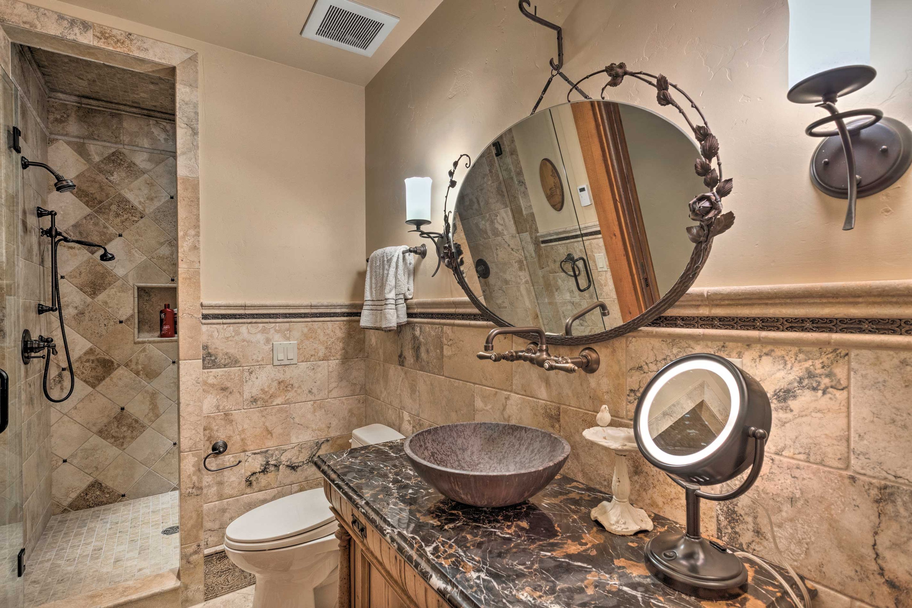Freshen up in the lavish fourth bath before dinner.
