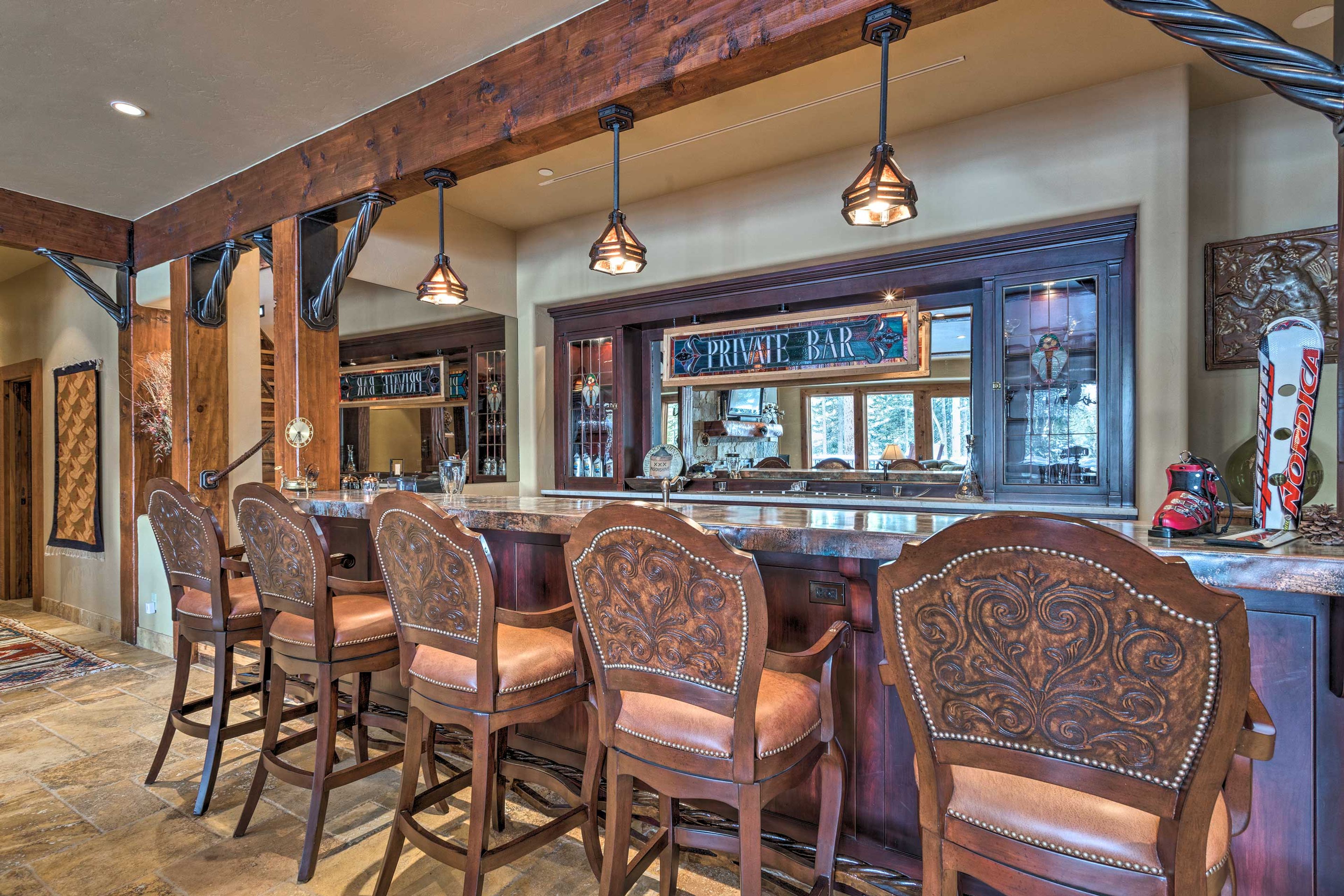 Grab a seat at the full service bar with seating for 5.