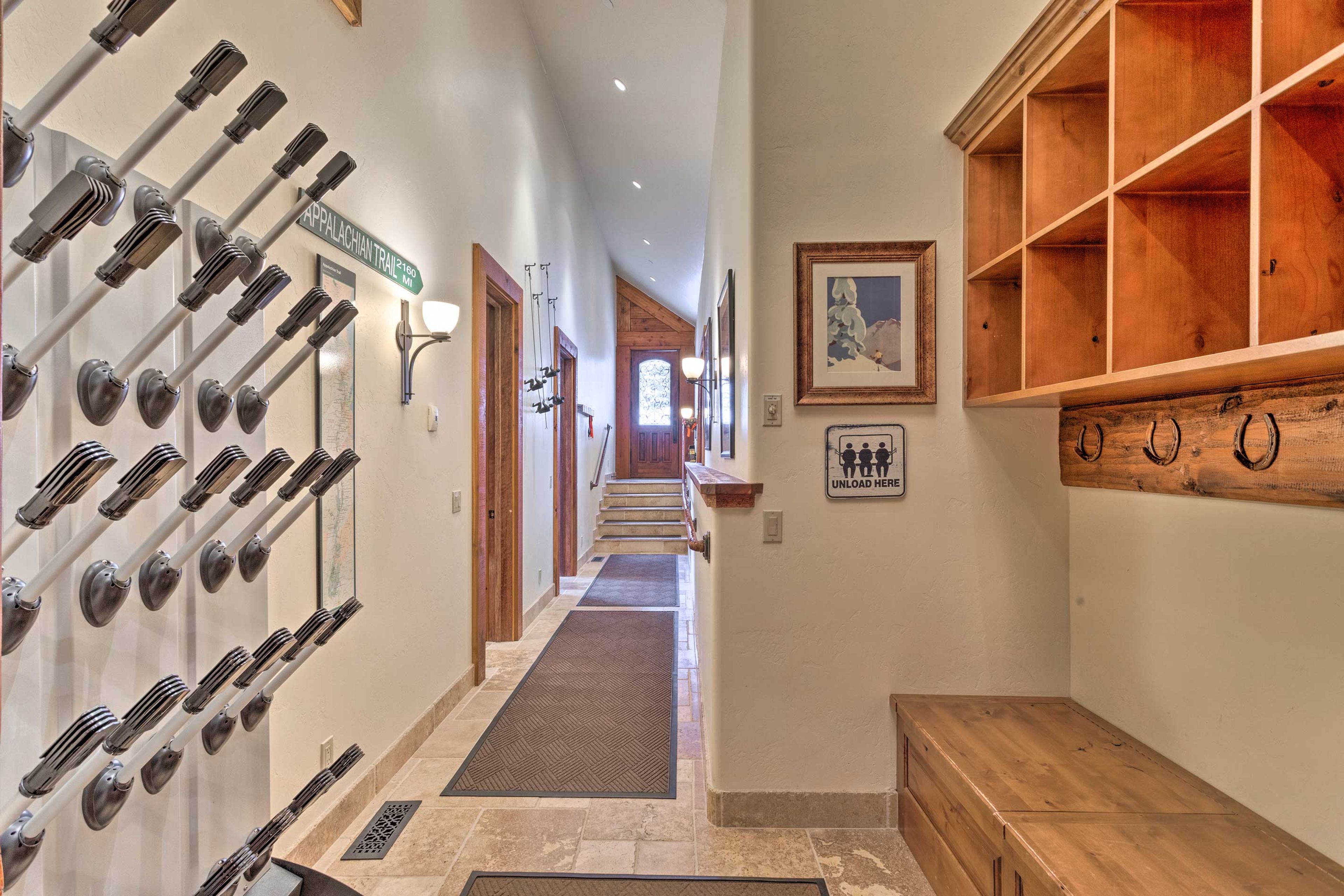 Store all your snow gear in the ski room complete with a boot-drying rack.