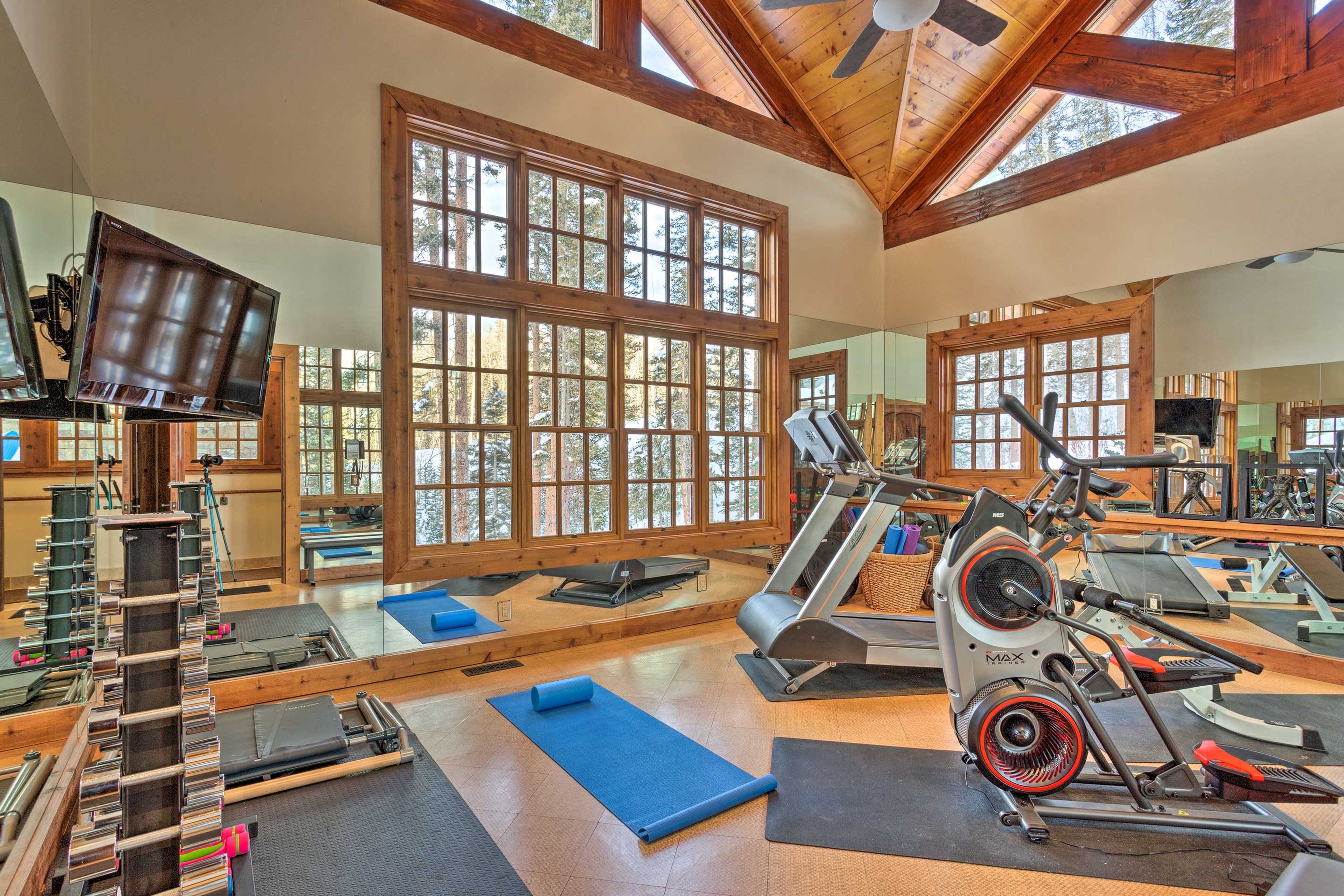 Stay active in the fully equipped exercise room with a treadmill and weights.