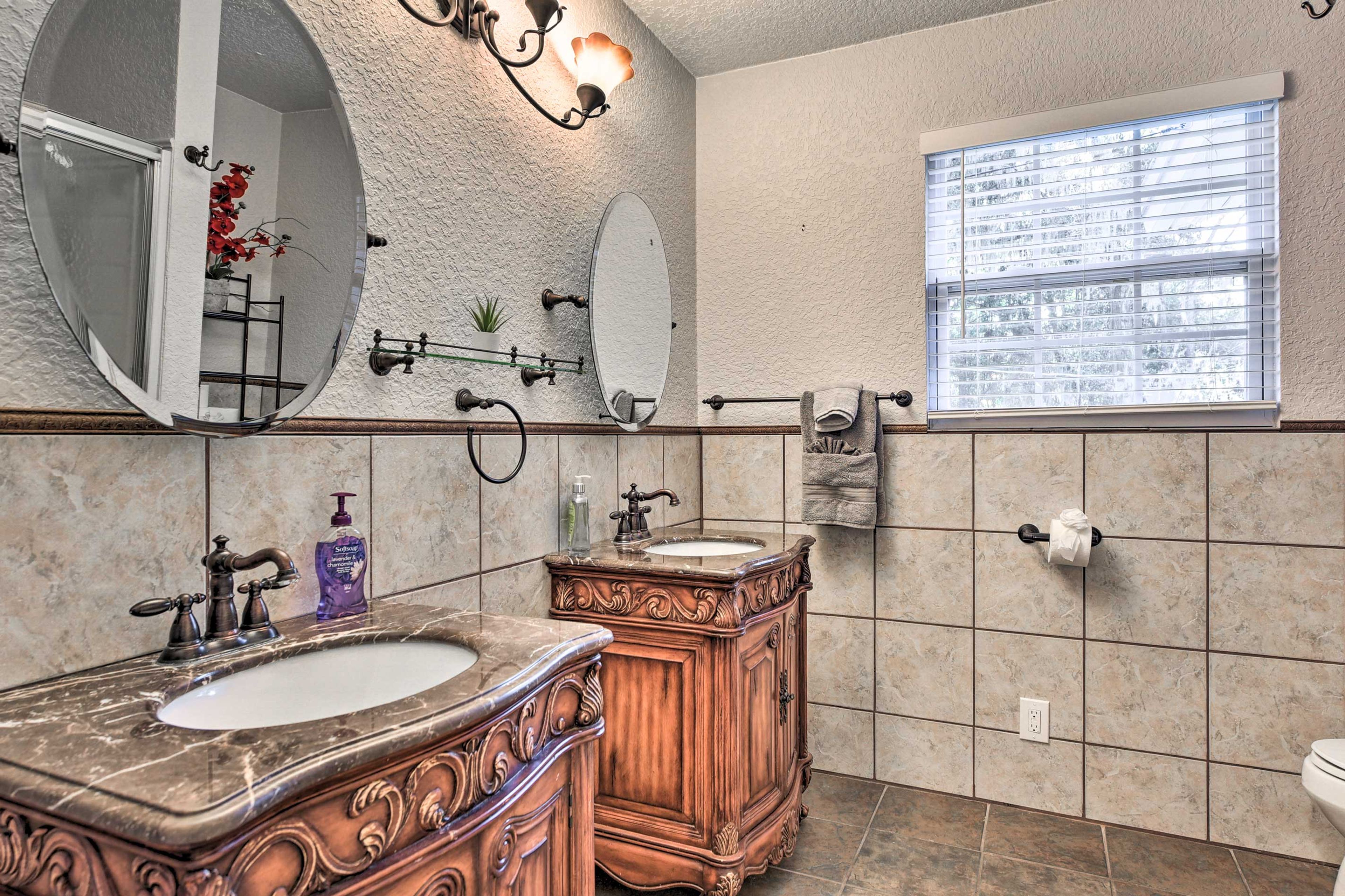 Wash off the day in this convenient dual-sink bathroom.