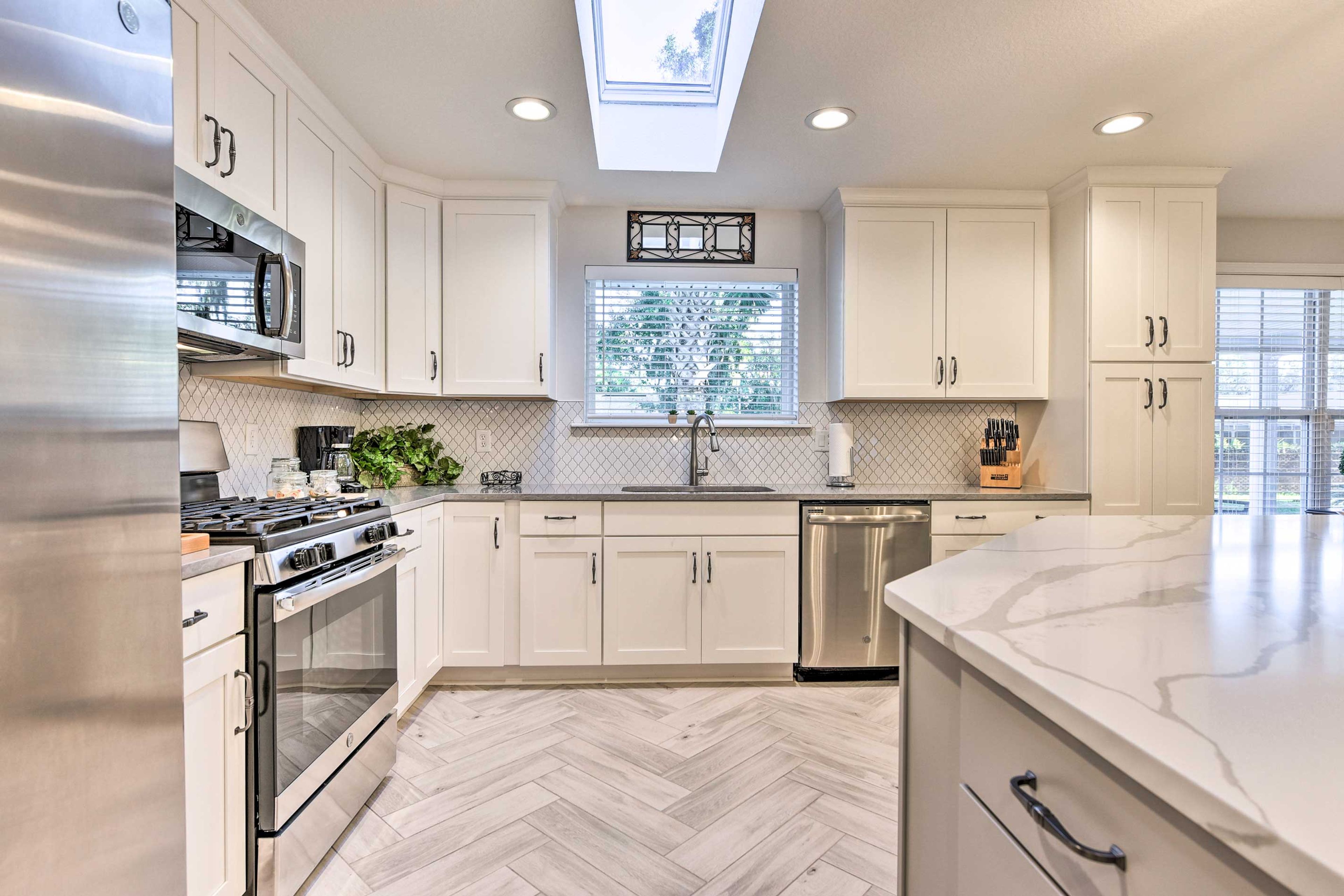 Cook in the freshly redesigned kitchen sporting stainless steel appliances.