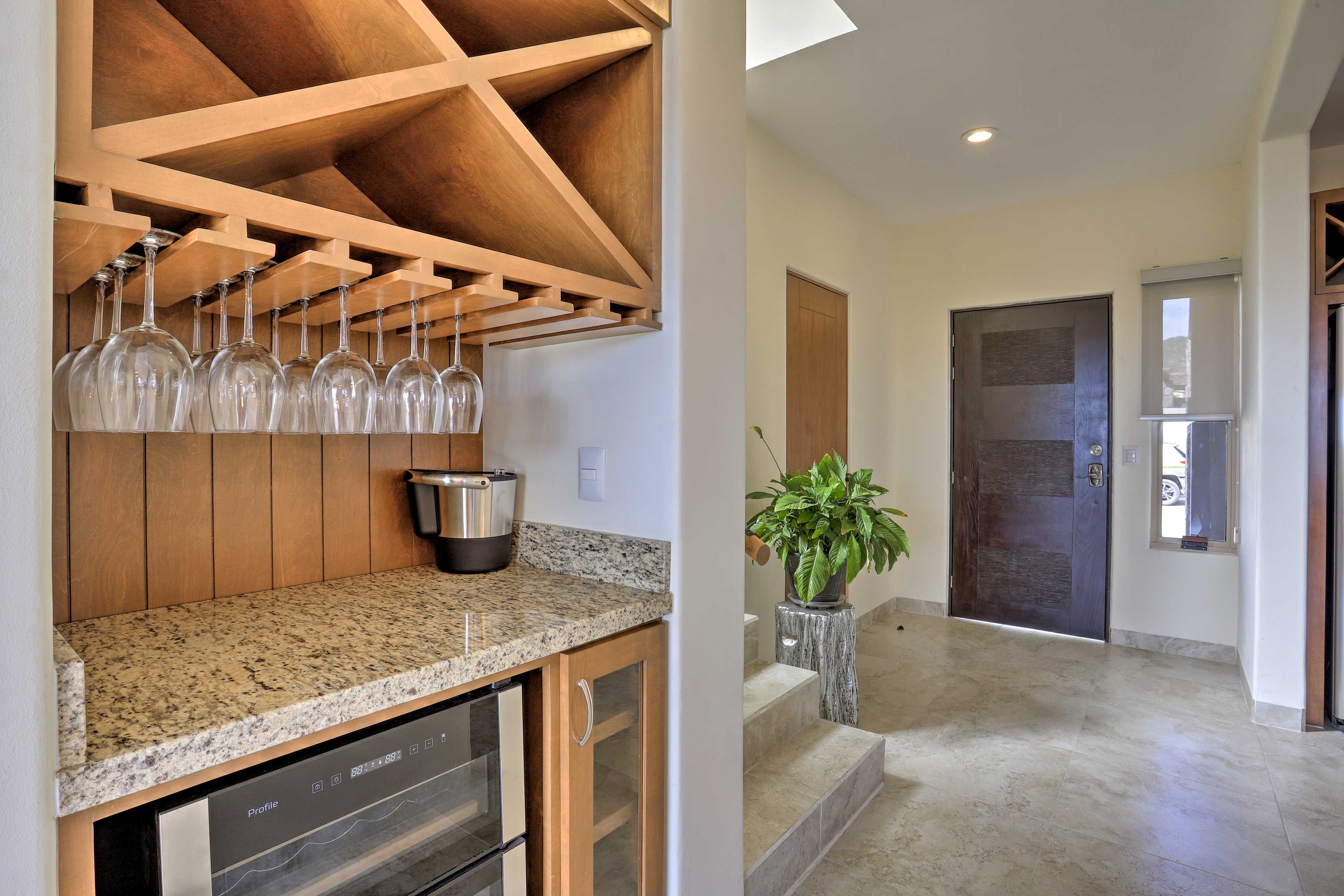 Stow a bottle of wine in the fridge.