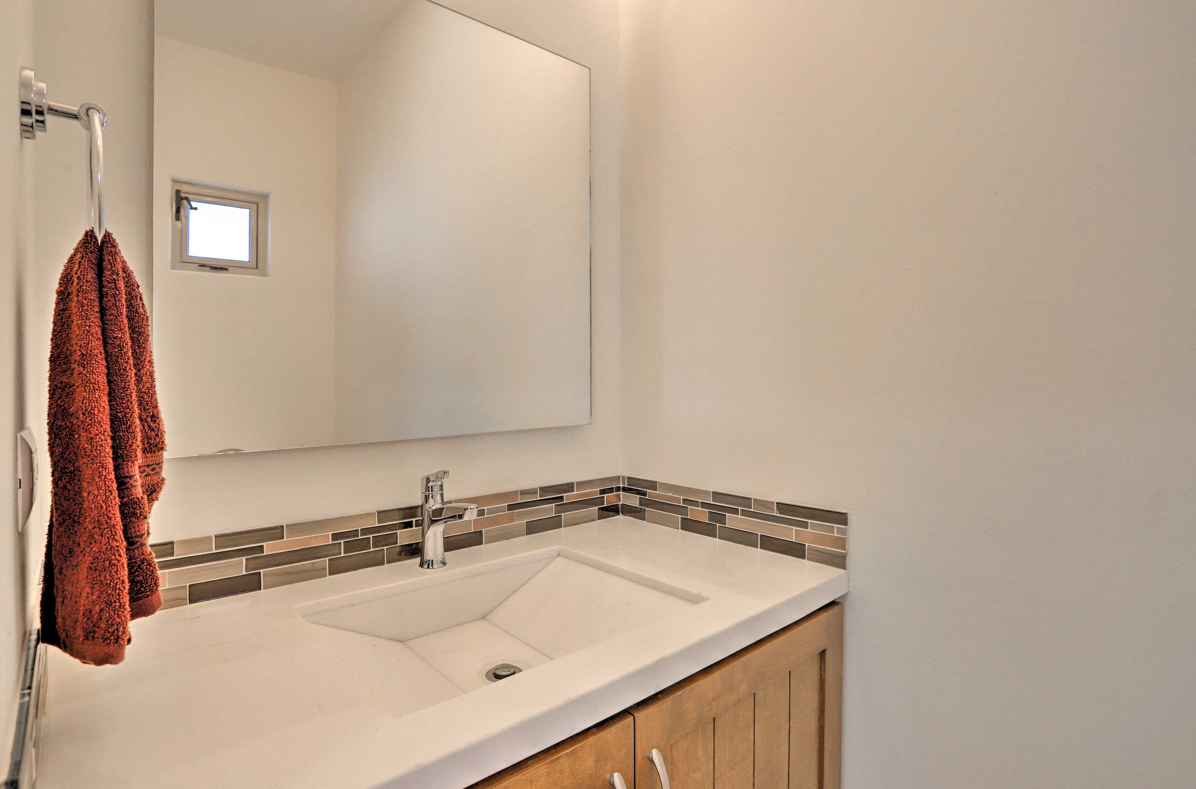 Freshen up in the half bath.