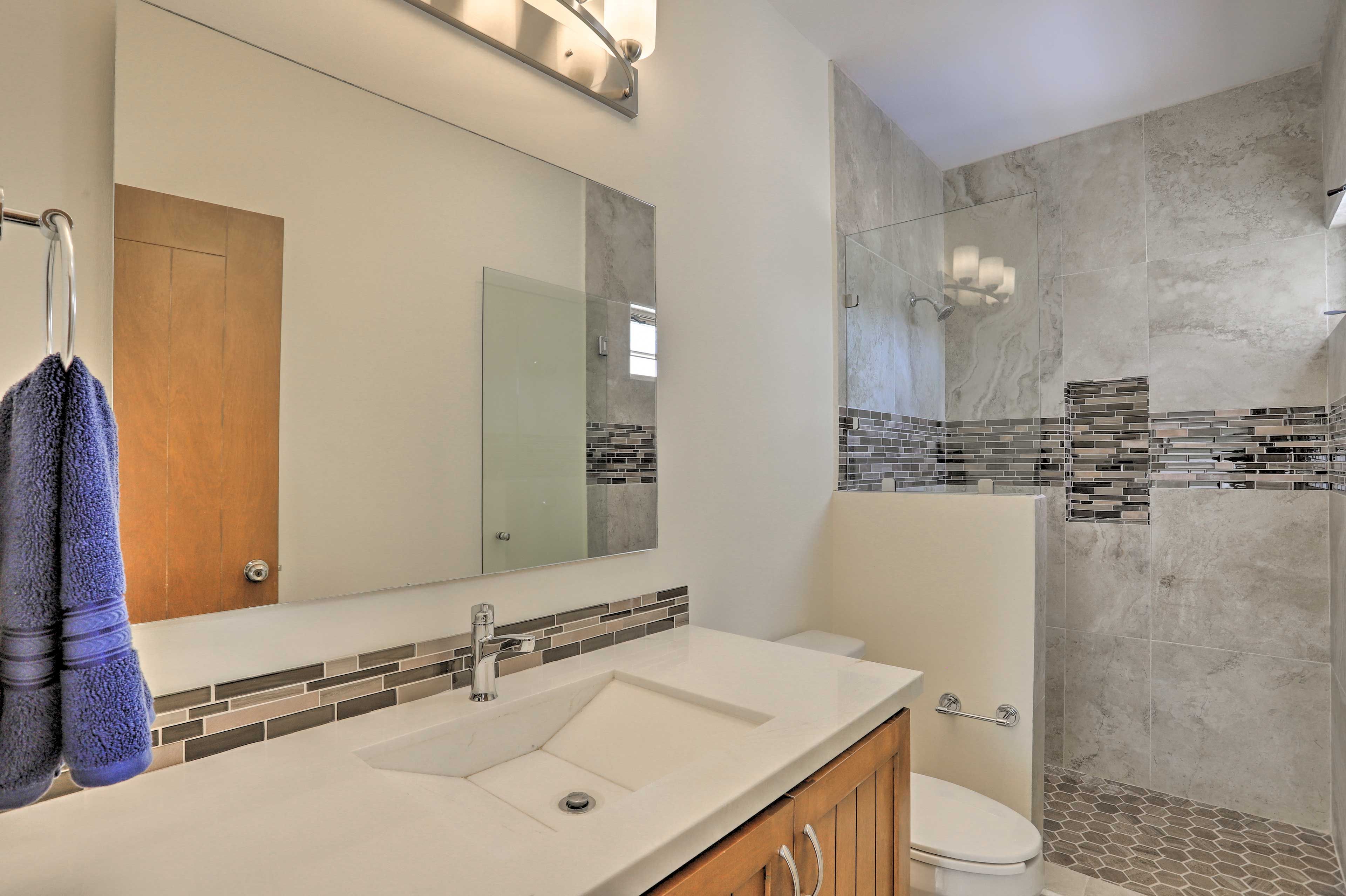 Rinse off lingering sand in the shower.