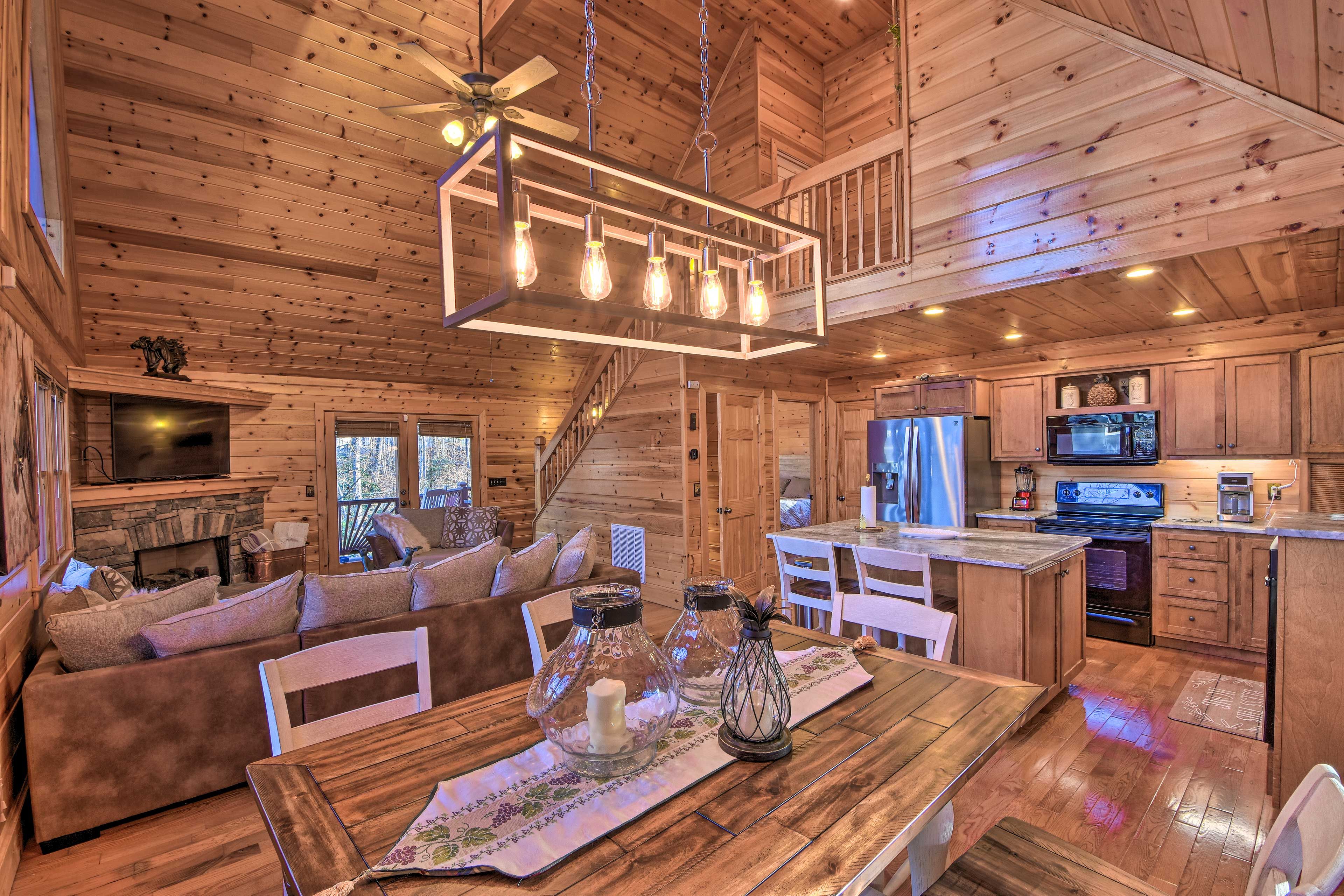 The dining table opens to the spacious kitchen.