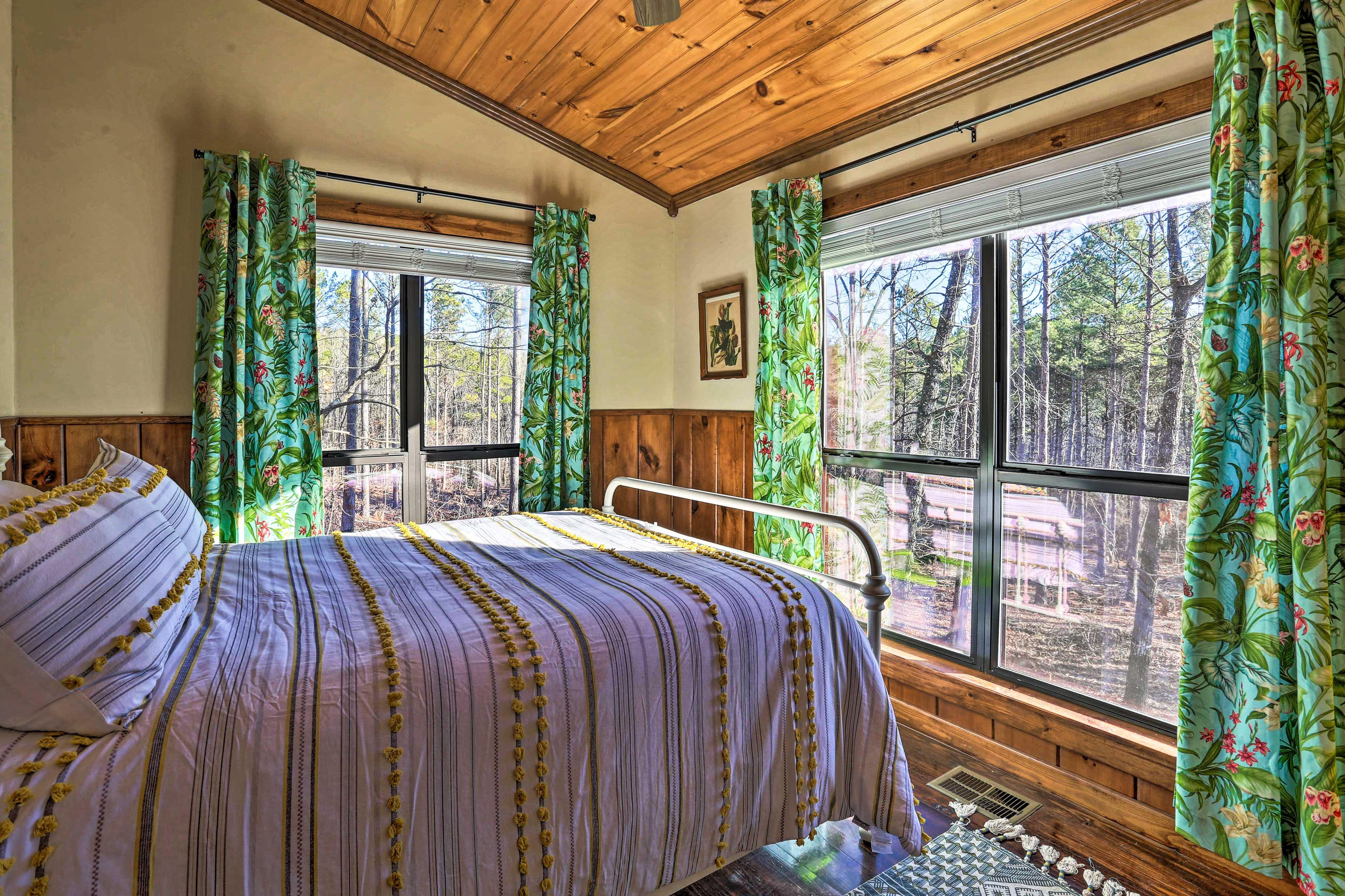 Two can share this cozy queen bed.
