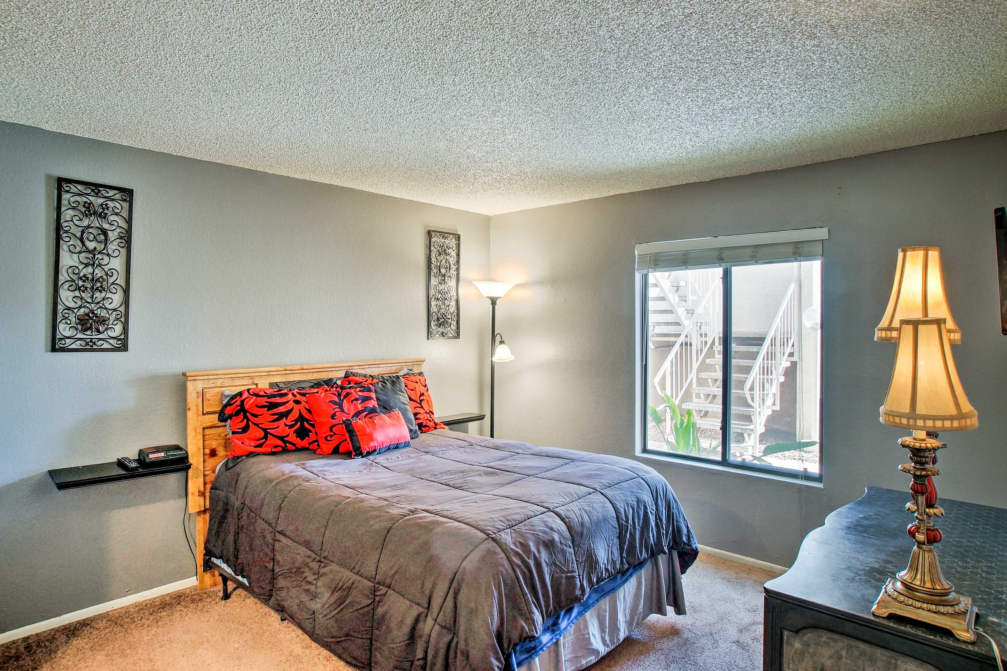 Enjoy the comfort of the queen-sized bed in the first bedroom.