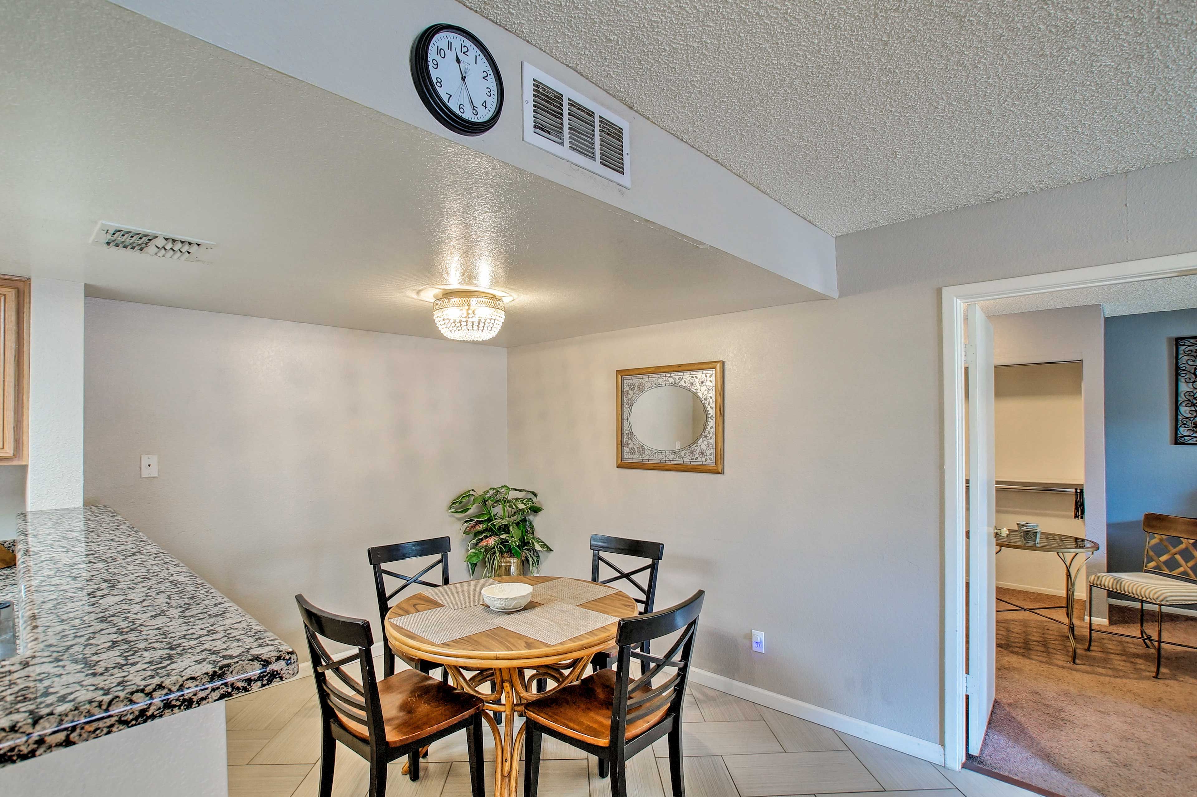 Share a home-made meal around the dining table set for 4.