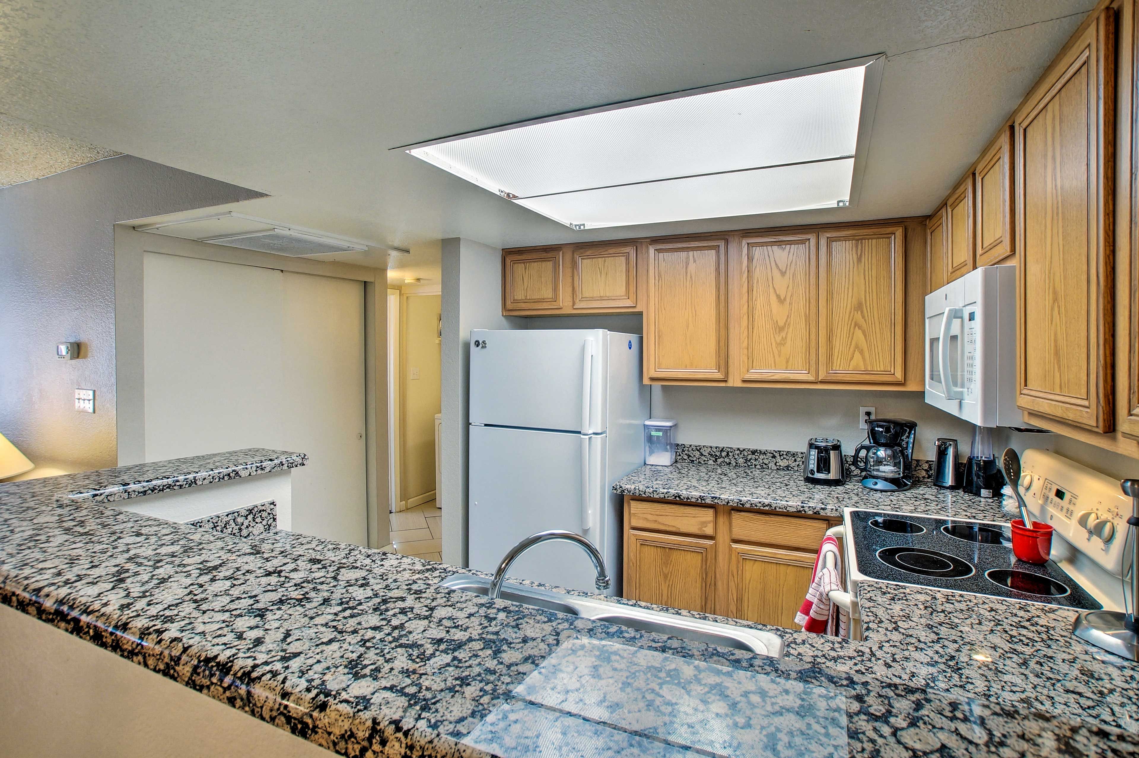 The kitchen features granite countertops and updated appliances.