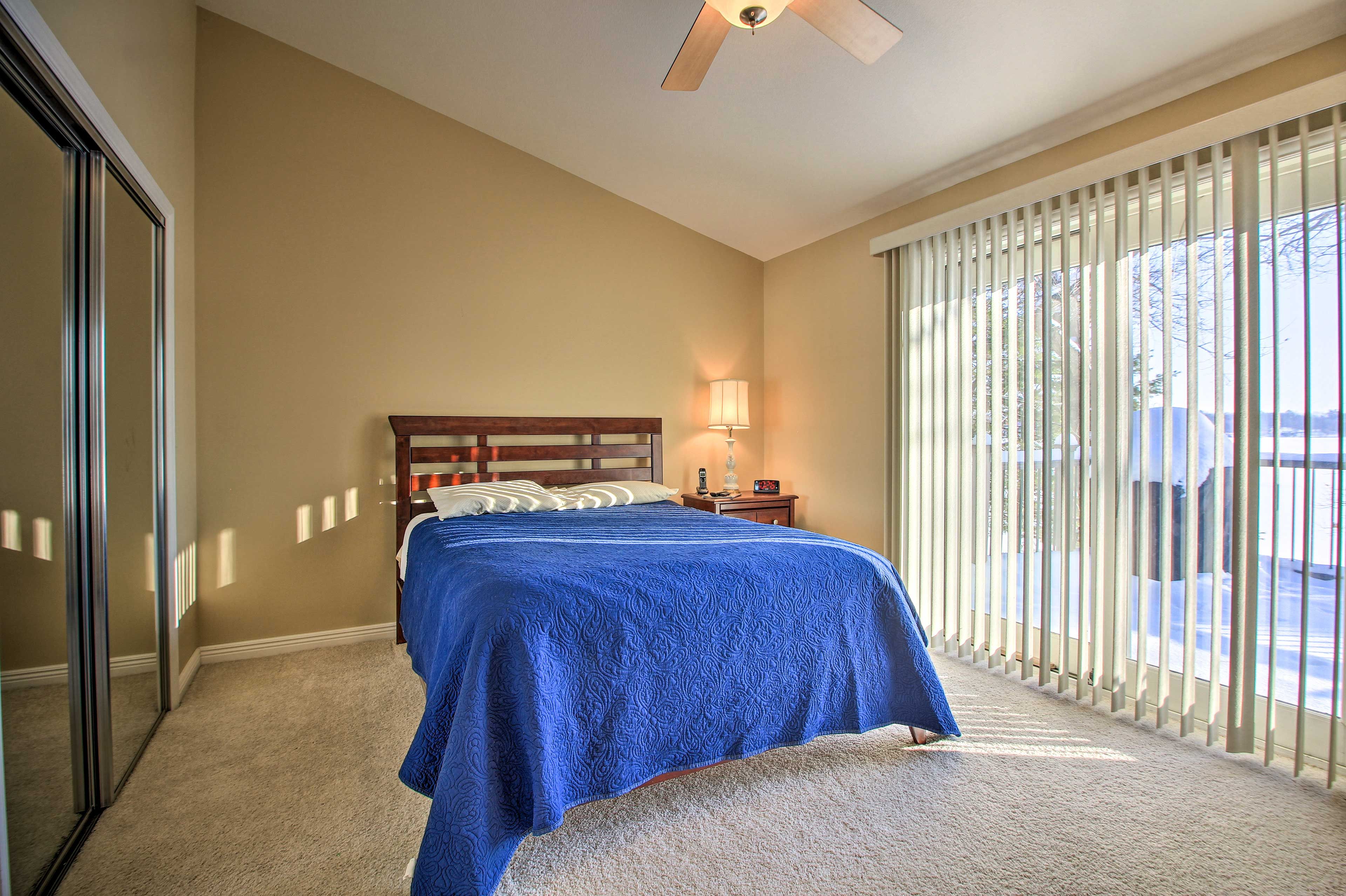 Bedroom 1 | Queen Bed | Deck Access | En-Suite Bathroom