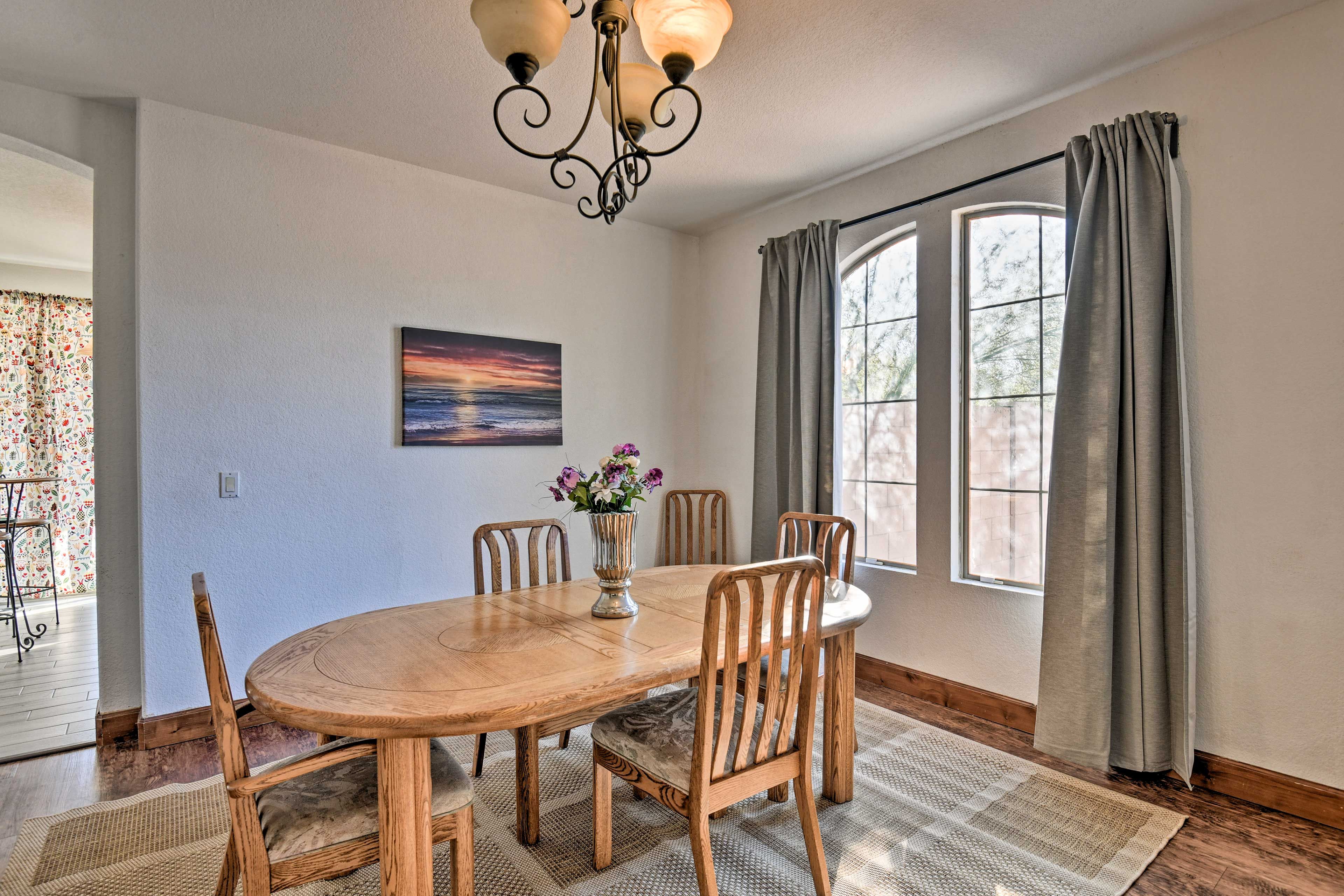 Share a homemade meal around the wooden dining table.