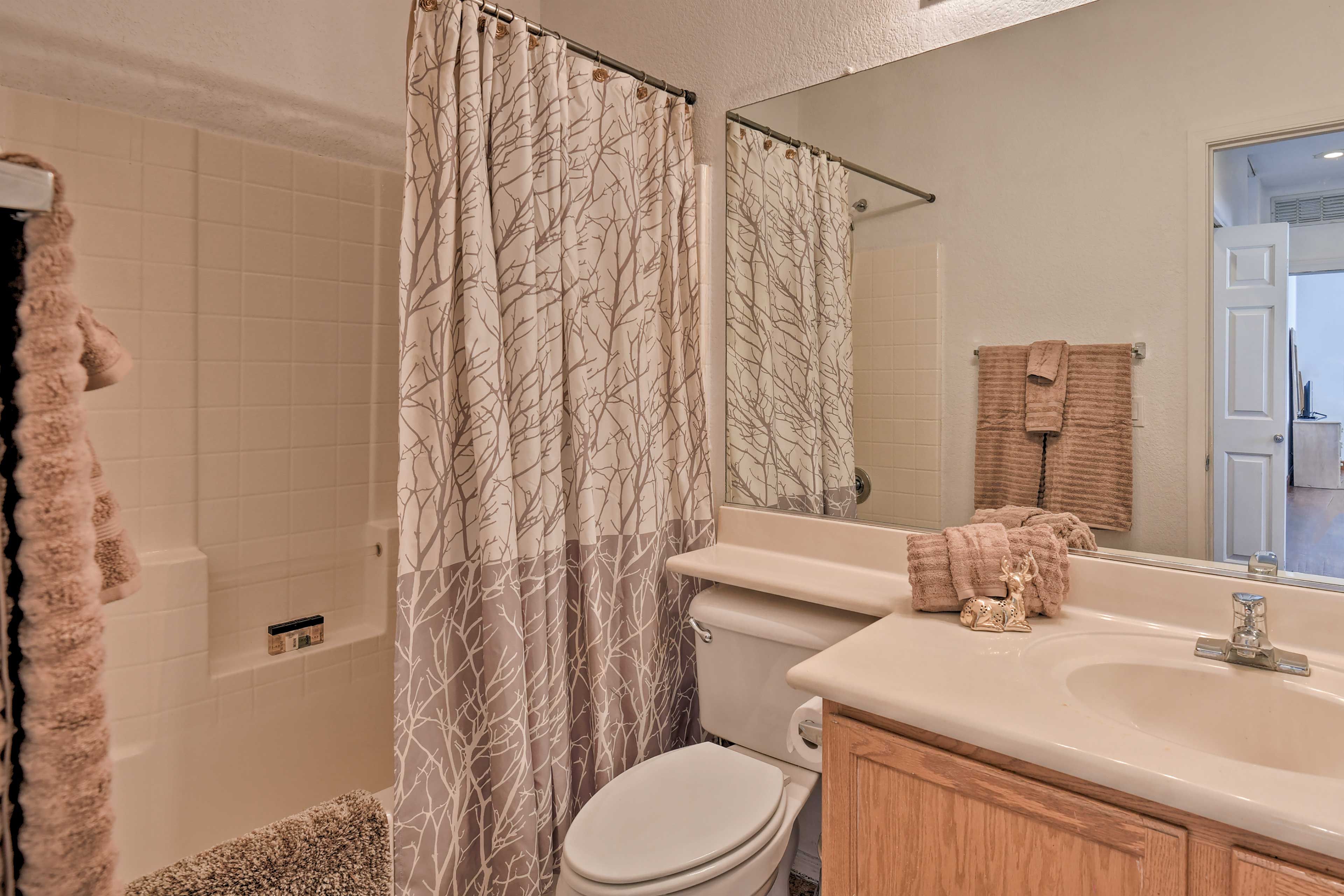 Rinse off in the second bath's shower/tub combo.