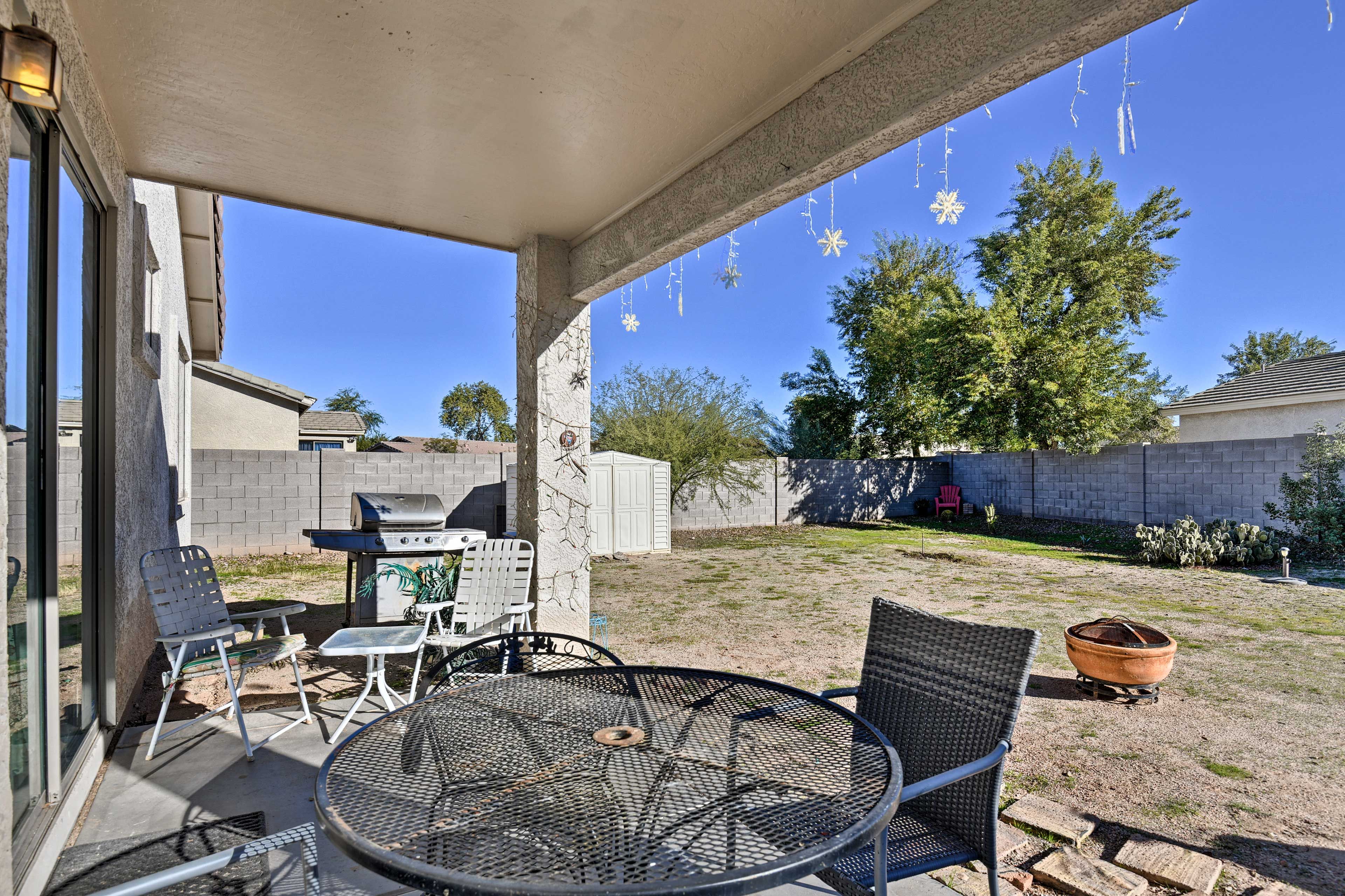 Dine al fresco around the outdoor dining table.