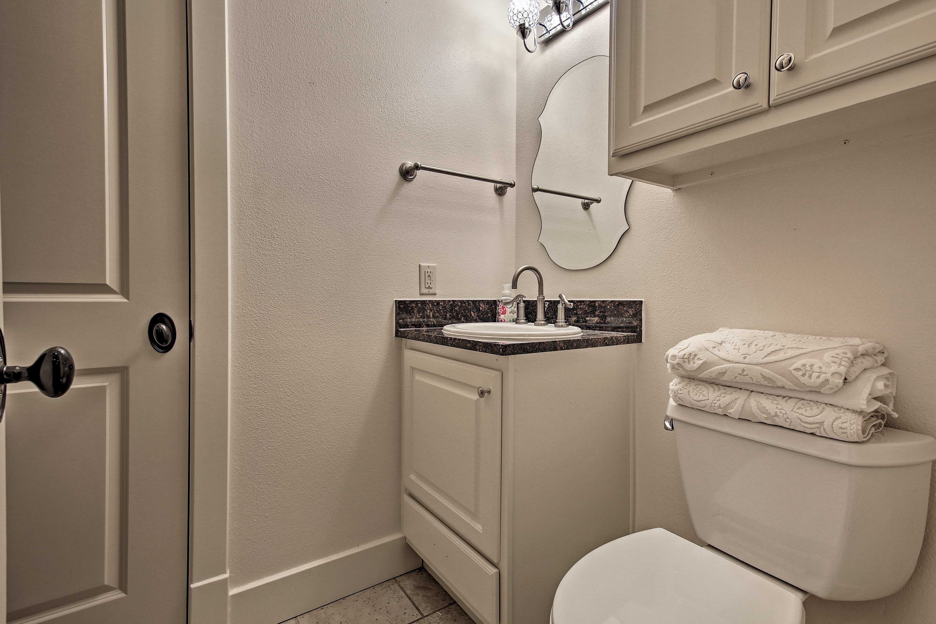 This bathroom is located on the first level of this town home.