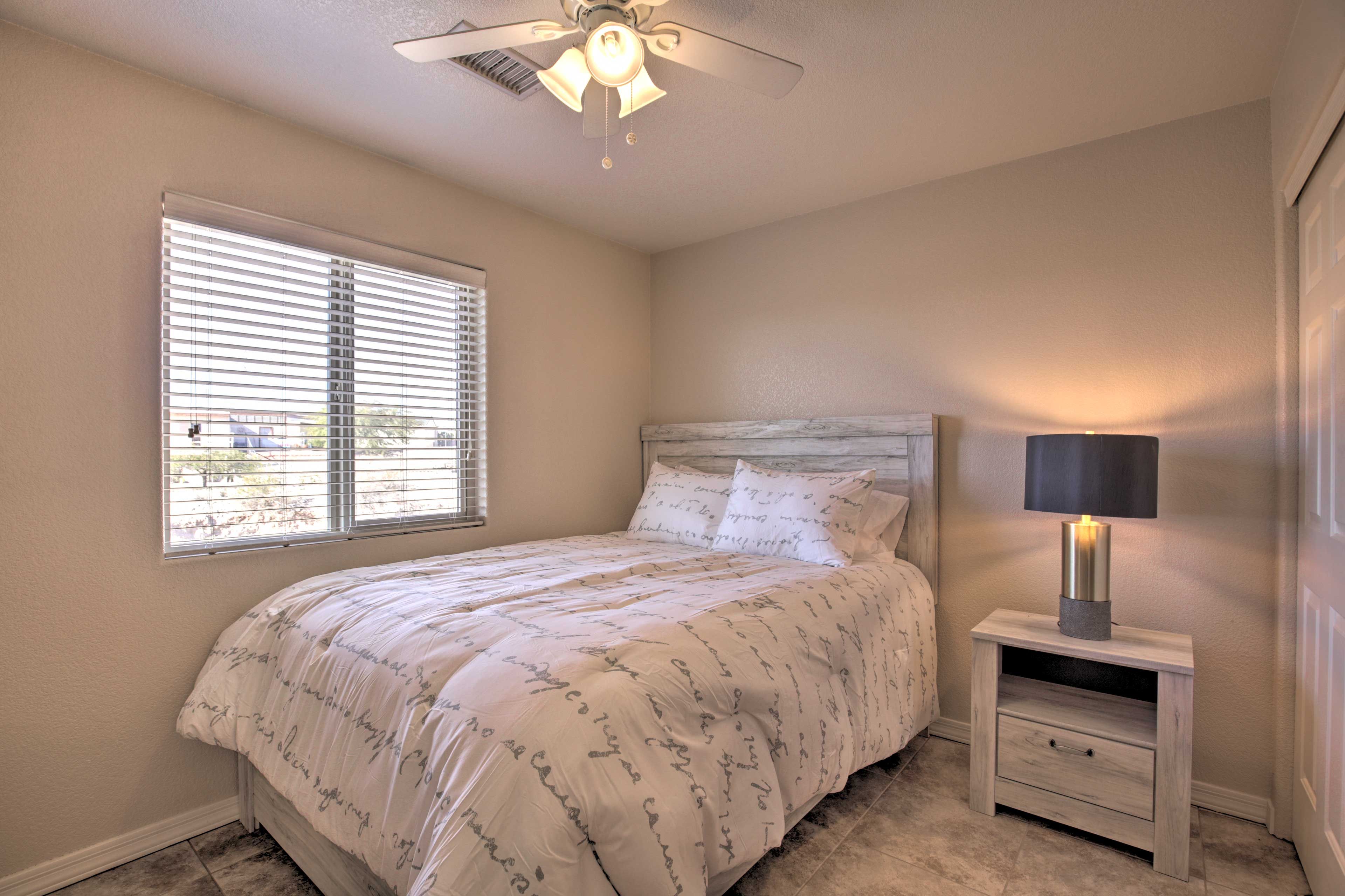 The final bedroom is outfitted with a queen bed as well.