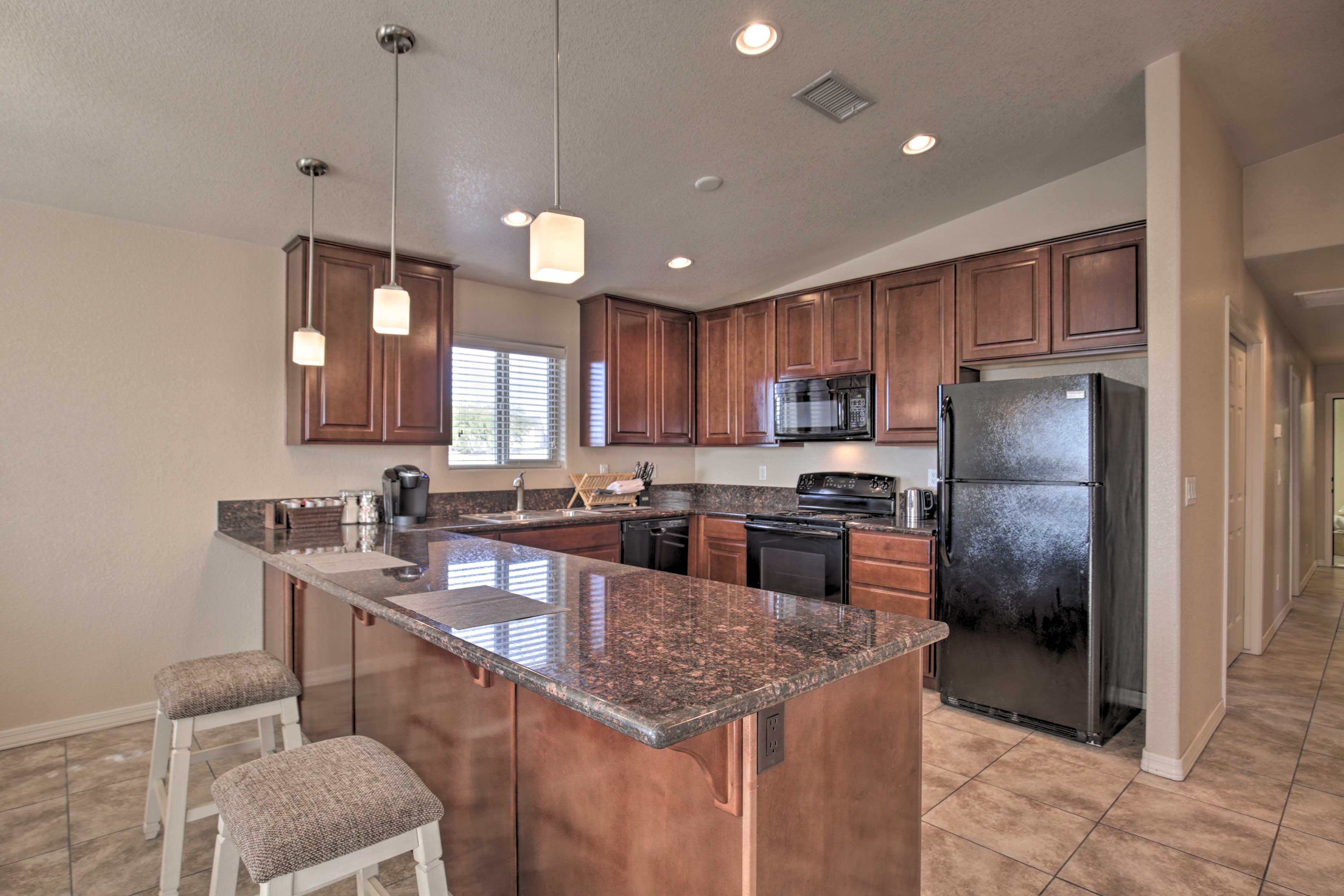 Additional seating is available at the breakfast bar.