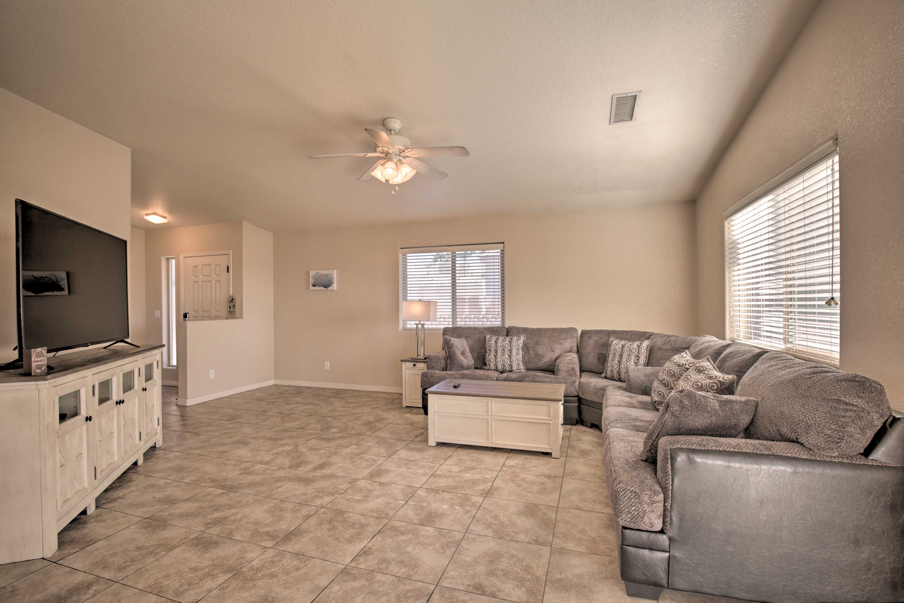 Kick back on the sectional sofa during downtime.