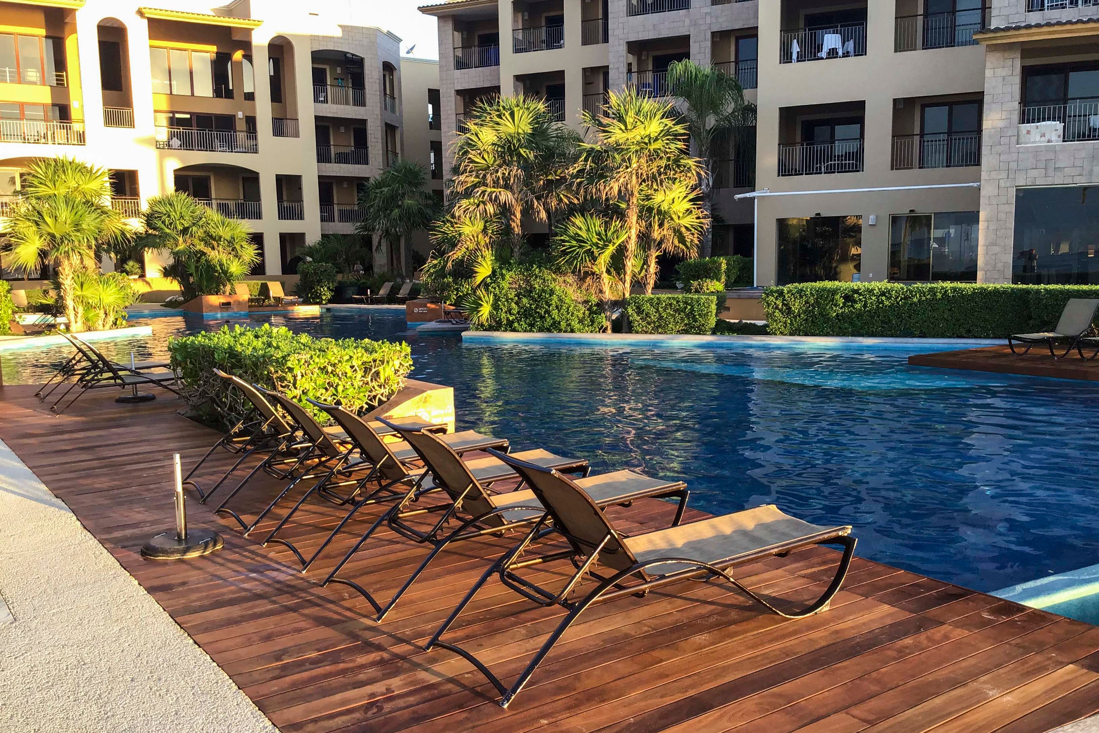 Community Amenities | Outdoor Infinity Pool | Cabanas