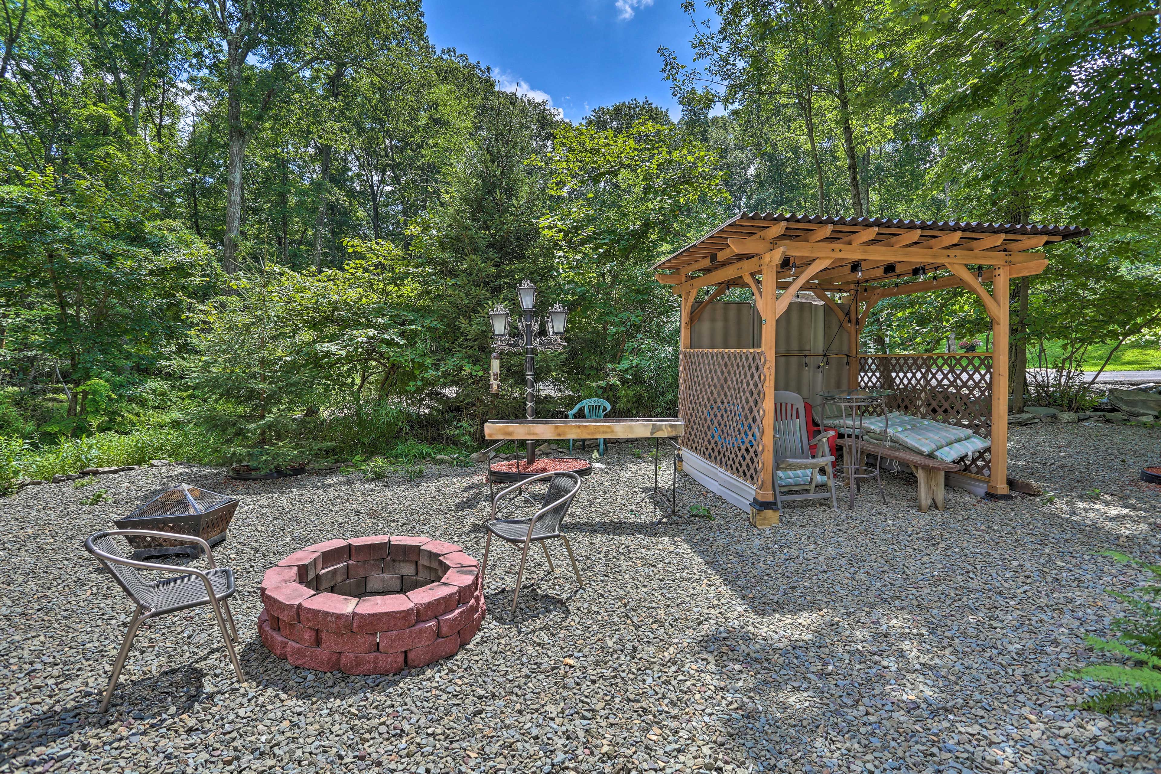 Property Exterior | Charcoal Grill | Koi Pond | Fire Pit